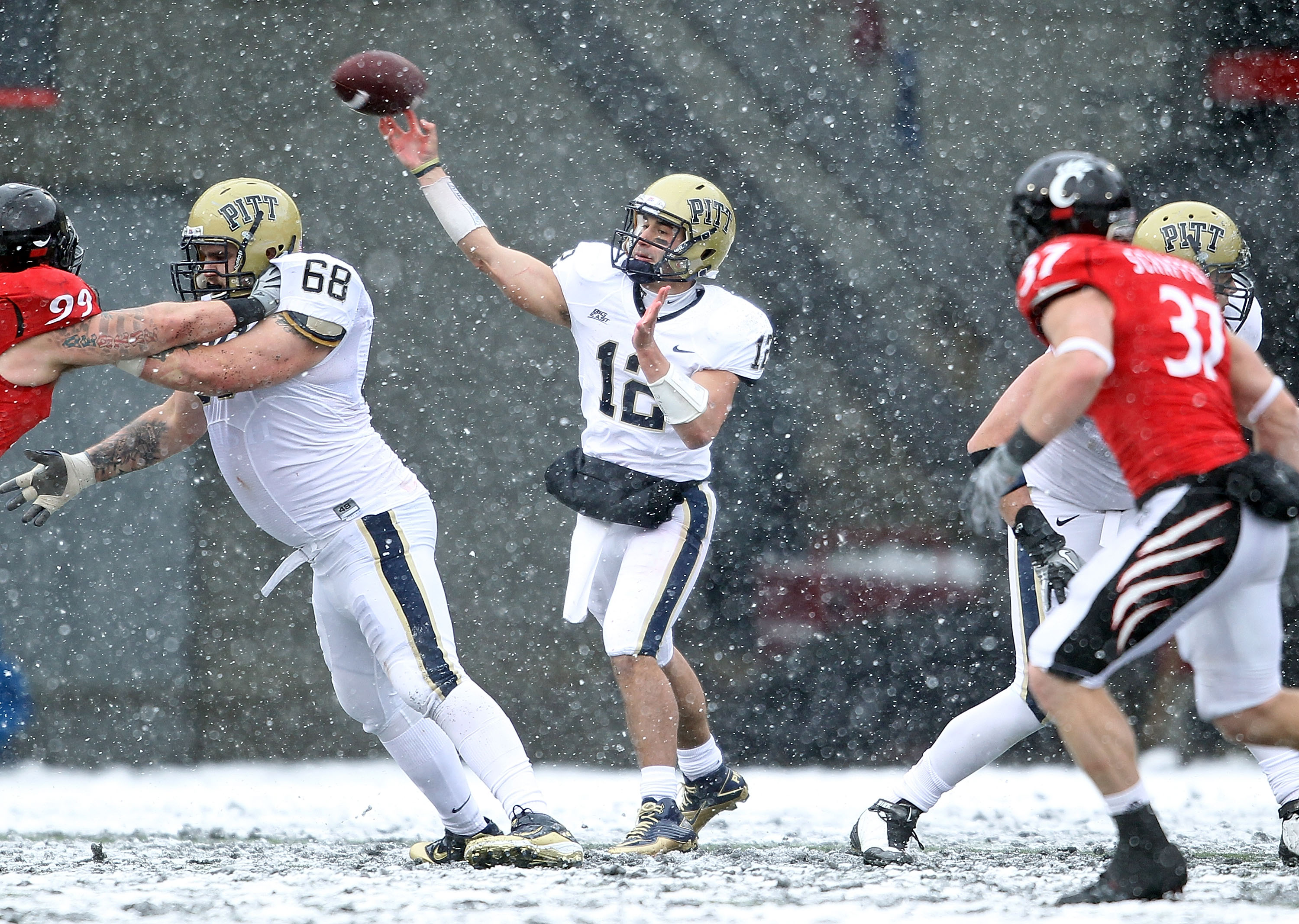 CINCINNATI, OH - DECEMBER 04:  Tino Sunseri #12 of the Pittsburgh Panthers throws the ball during the Big East Conference game against the Cincinnati Bearcats at Nippert Stadium on December 4, 2010 in Cincinnati, Ohio.  Pittsburgh won 28-10.  (Photo by An