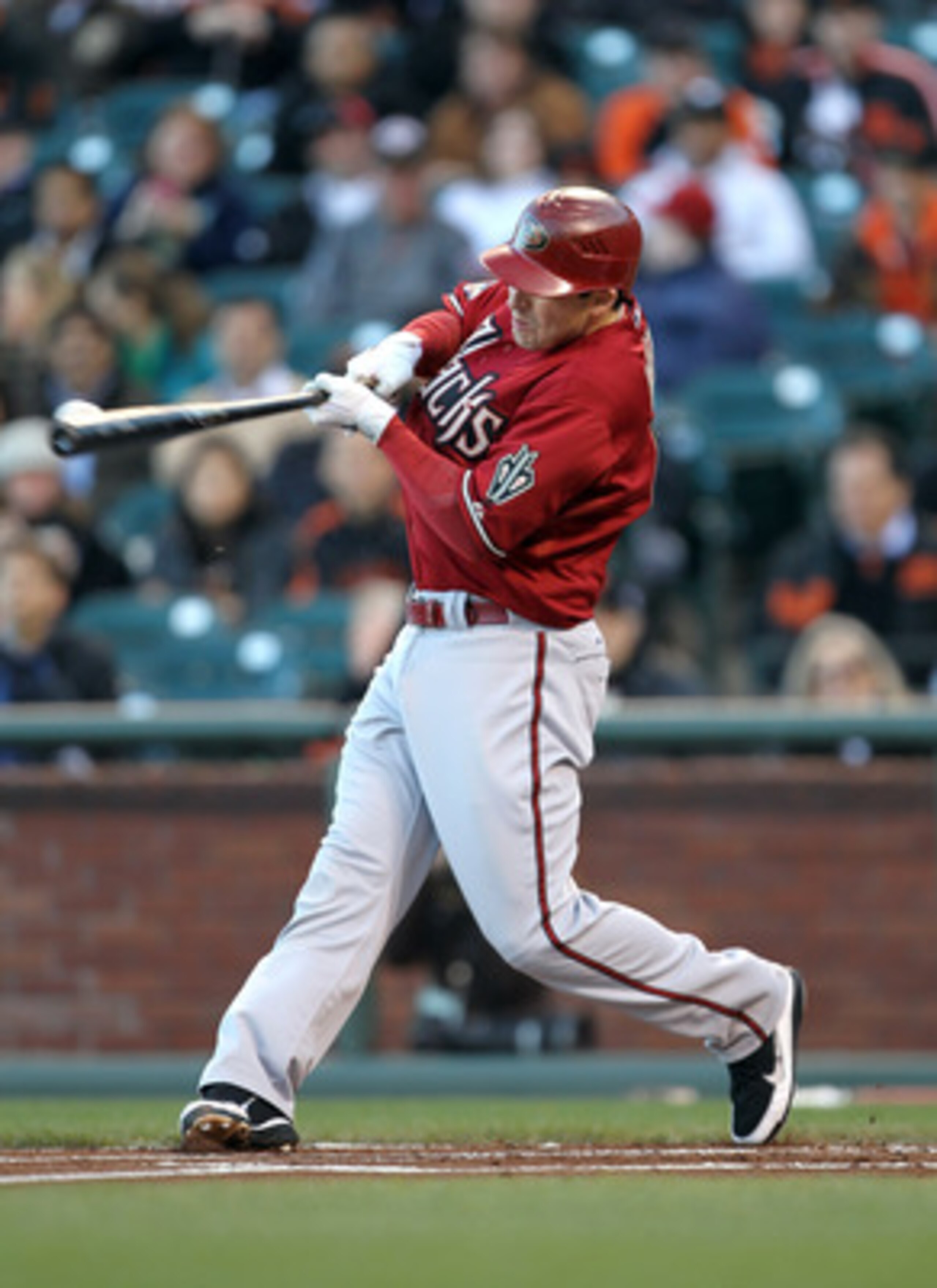 SAN FRANCISCO, CA - MAY 11:  Stephen Drew #6 of the Arizona Diamondbacks hits a RBI ground out that scored Kelly Johnson #2 of the Arizona Diamondbacks in the first inning of their game against the San Francisco Giants at AT&T Park on May 11, 2011 in San