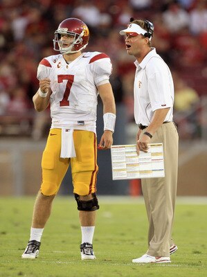 PALO ALTO, CA - OCTOBER 09: Matt Barkley #7 of the USC Trojans speaks with head coach Lane Kiffin during their game against the Stanford Cardinal at Stanford Stadium on October 9, 2010 in Palo Alto, California. (Photo by Ezra Shaw/Getty Images) PALO ALTO, CA - OCTOBER 09: Matt Barkley #7 of the USC Trojans speaks with head coach Lane Kiffin during their game against the Stanford Cardinal at Stanford Stadium on October 9, 2010 in Palo Alto, California. (Photo by Ezra Shaw/Getty Images)