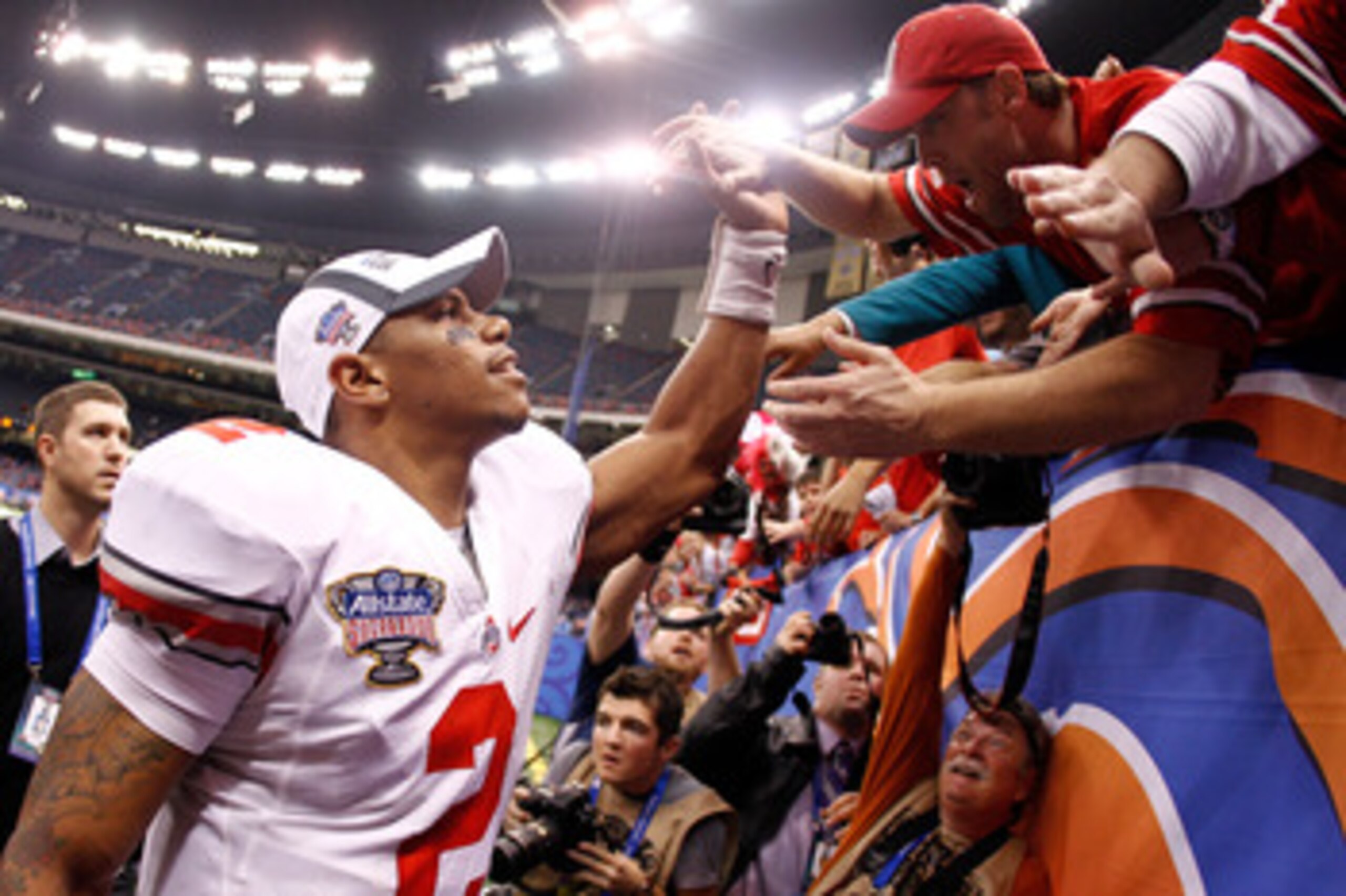 NEW ORLEANS, LA - JANUARY 04:  Quarterback Terrelle Pryor #2 of the Ohio State Buckeyes celebrates the Buckeyes 31-26 victory against the Arkansas Razorbacks during the Allstate Sugar Bowl at the Louisiana Superdome on January 4, 2011 in New Orleans, Loui