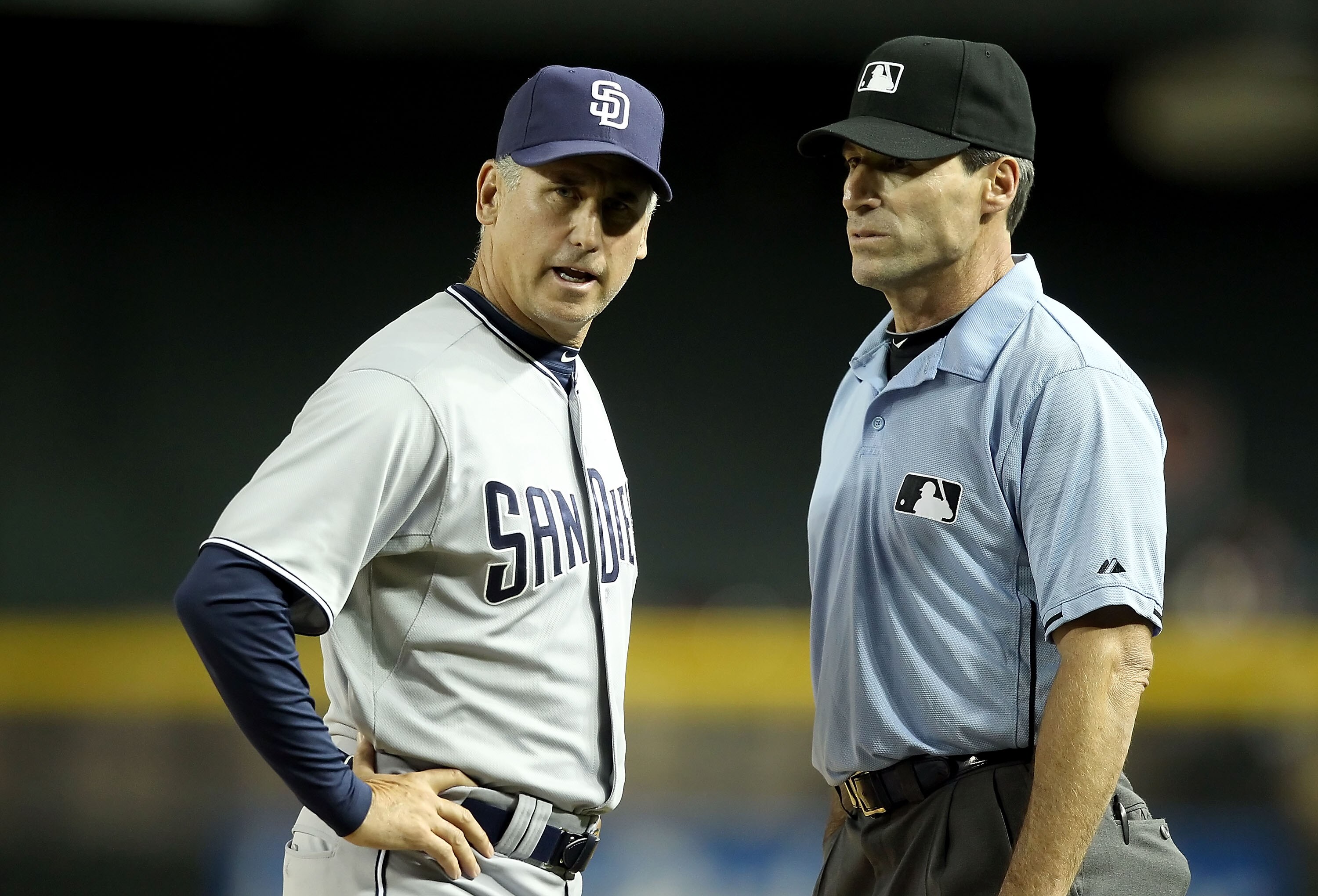 PHOENIX, AZ - MAY 16:  Manager Bud Black of the San Diego Padres argues with umpire Angel Hernandez during the Major League Baseball game against the Arizona Diamondbacks at Chase Field on May 16, 2011 in Phoenix, Arizona. The Padres defeated the Diamondb