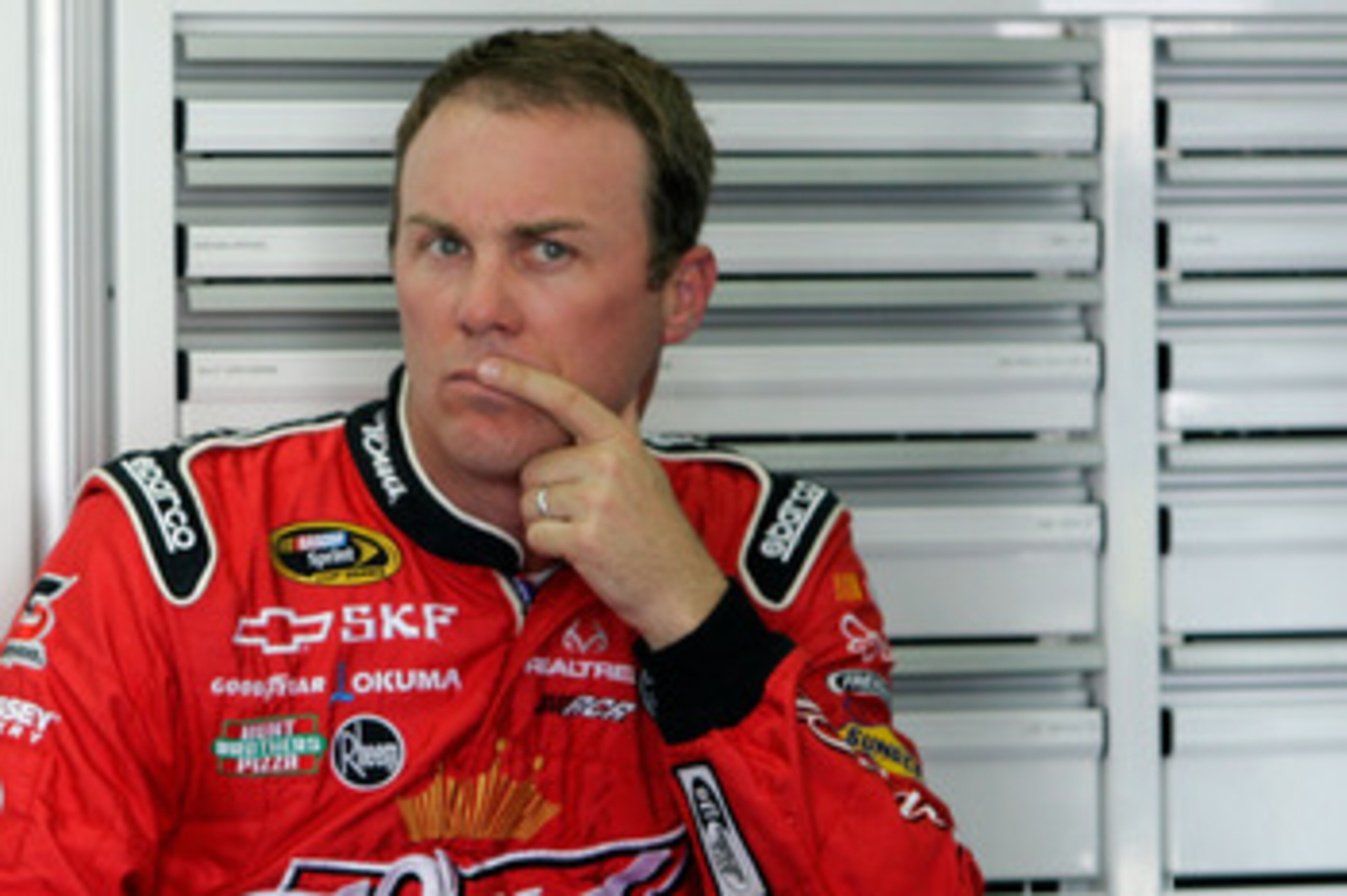 CHARLOTTE, NC - MAY 26:  Kevin Harvick, driver of the #33 Rheem Tankless Water Heaters Chevrolet, sits in the garage during practice for the NASCAR Nationwide Series Top Gear 300 at Charlotte Motor Speedway on May 26, 2011 in Charlotte, North Carolina.  (