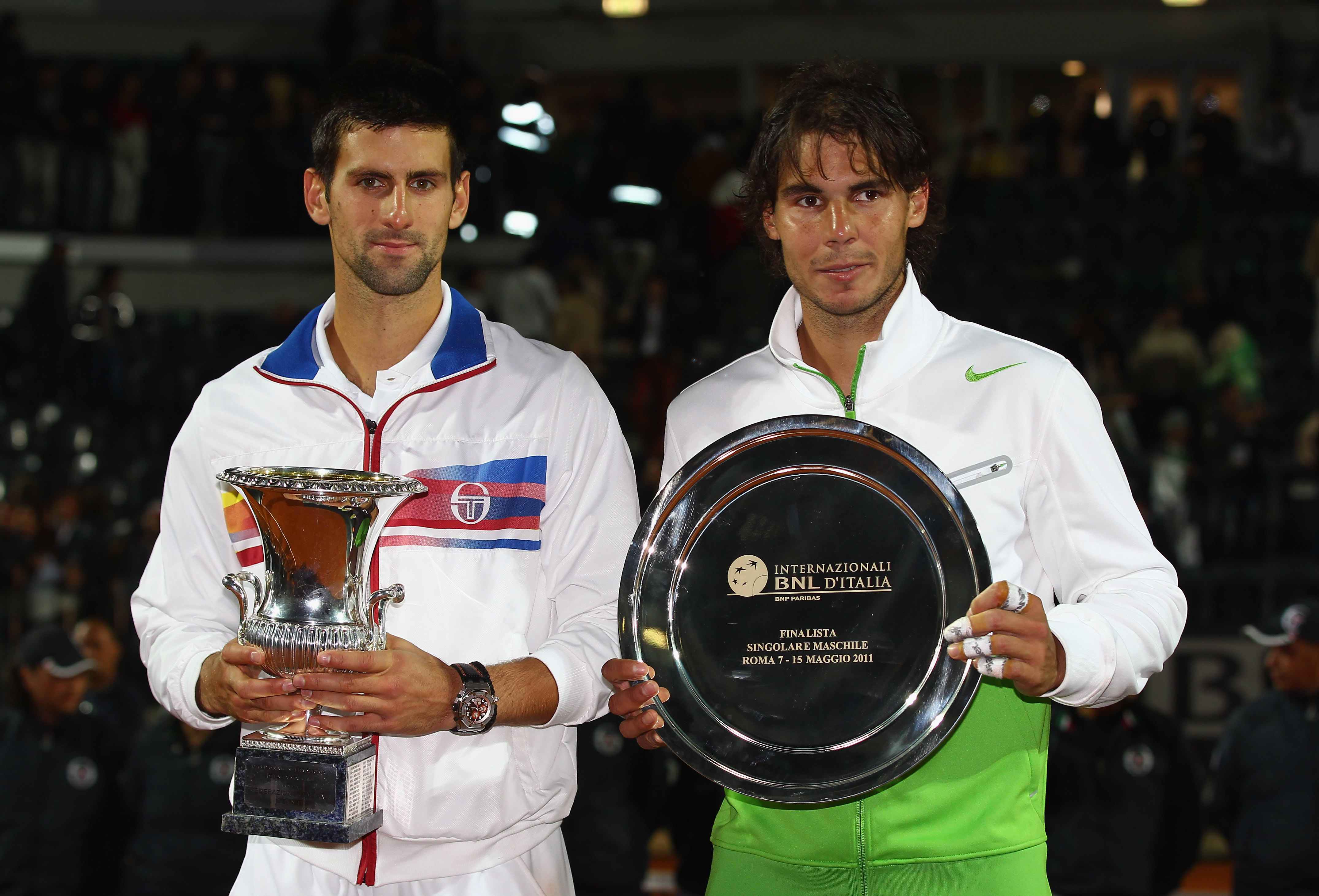 ROME, ITALY - MAY 15:  Novak Djokovic of Serbia holds the trophy after his victory in the final against Rafael Nadal of Spain during day eight of the Internazoinali BNL D'Italia at the Foro Italico Tennis Centre on May 15, 2011 in Rome, Italy.  (Photo by