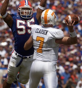 GAINSVILLE, FL - SEPTEMBER 20:  Linebacker Channing Crowder #55 of the University of Florida Gators deflects a pass by quarterback Casey Clausen #7 of the University of Tennessee Volunteers during the game at Ben Hill Griffin Stadium on September 20, 2003