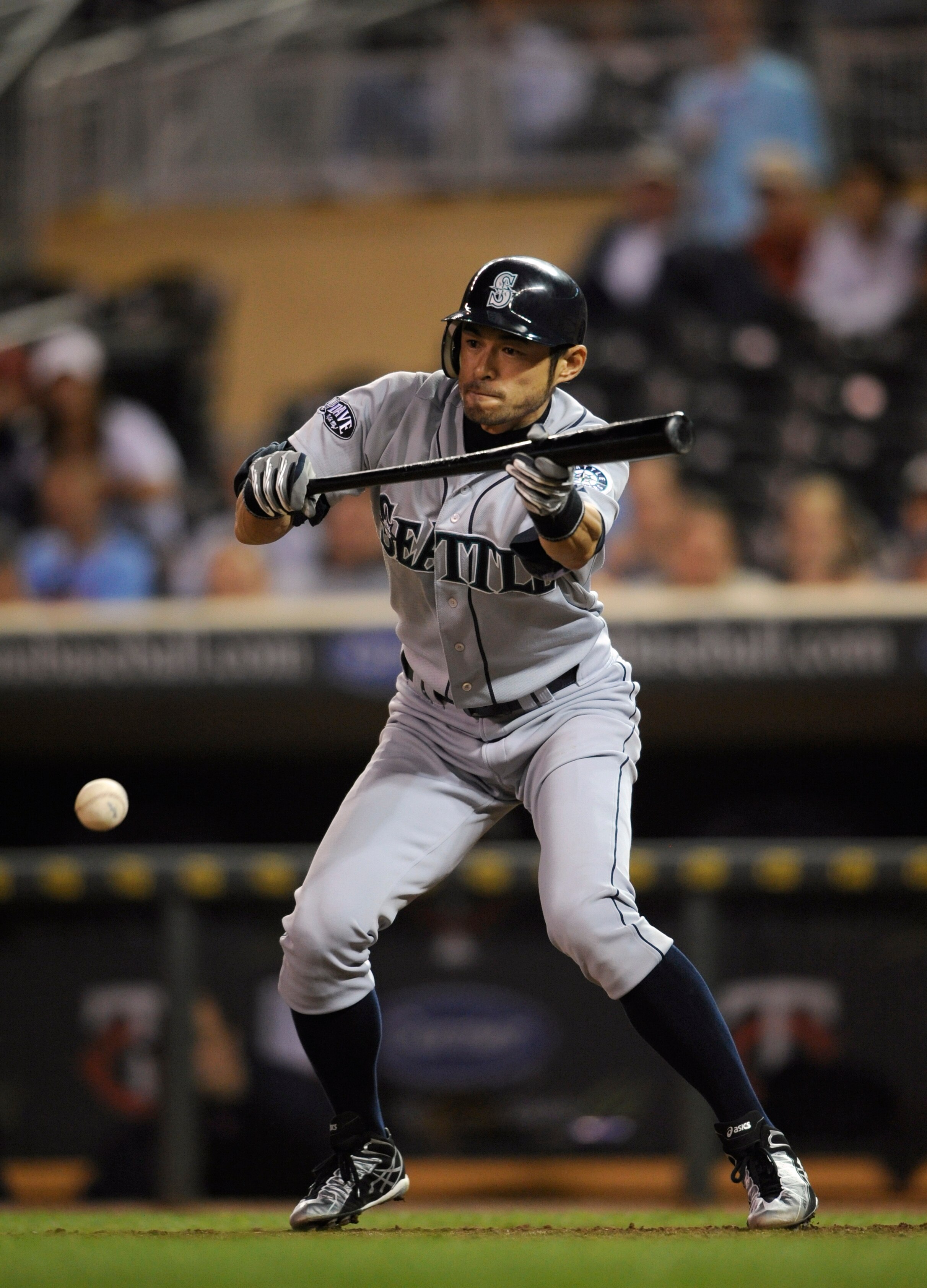 MINNEAPOLIS, MN - MAY 23: Ichiro Suzuki #51 of the Seattle Mariners bunts against the Minnesota Twins during their game on May 23, 2011 at Target Field in Minneapolis, Minnesota. The Rockies won 6-5. (Photo by Hannah Foslien/Getty Images)
