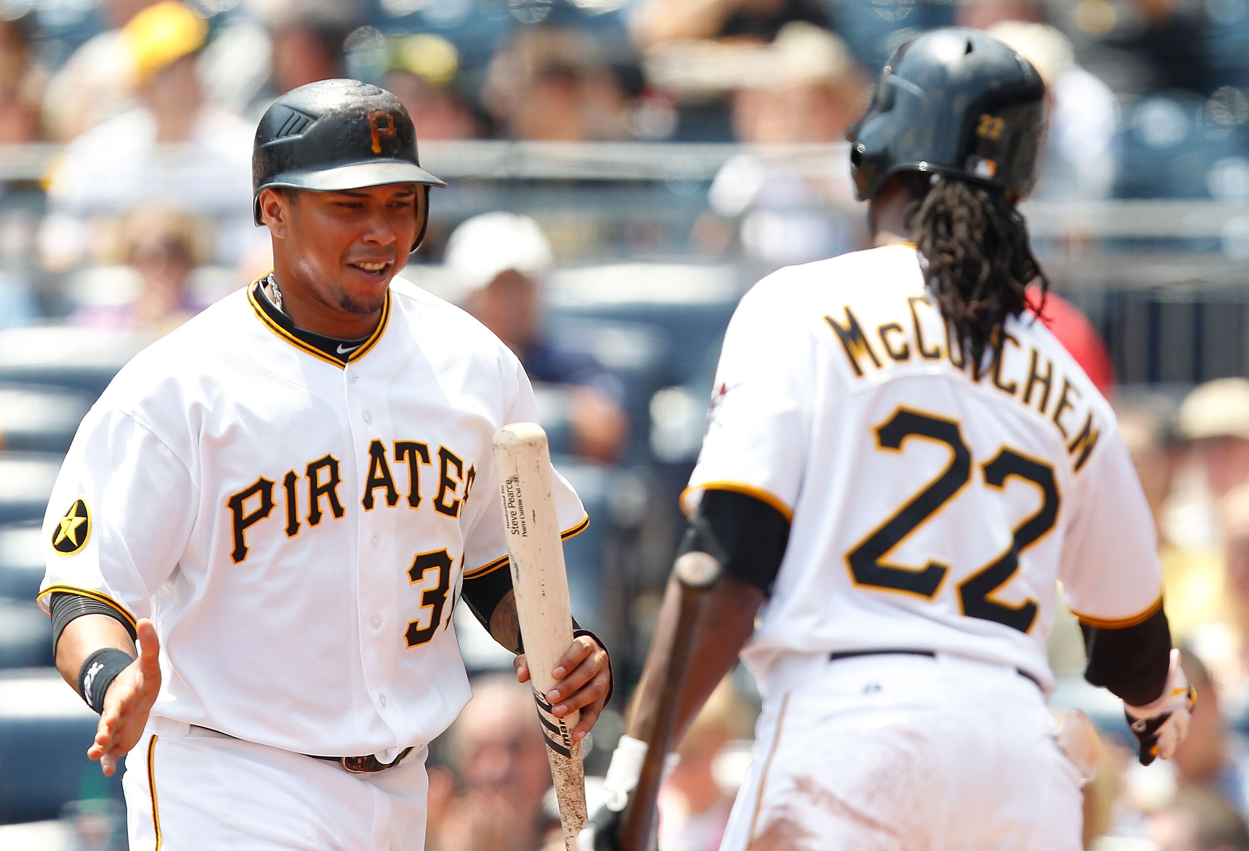 PITTSBURGH - MAY 25:  Jose Tabata #31 of the Pittsburgh Pirates celebrates with teammate Andrew McCutchen #22 after scoring against the Atlanta Braves during the game on May 25, 2011 at PNC Park in Pittsburgh, Pennsylvania.  (Photo by Jared Wickerham/Gett