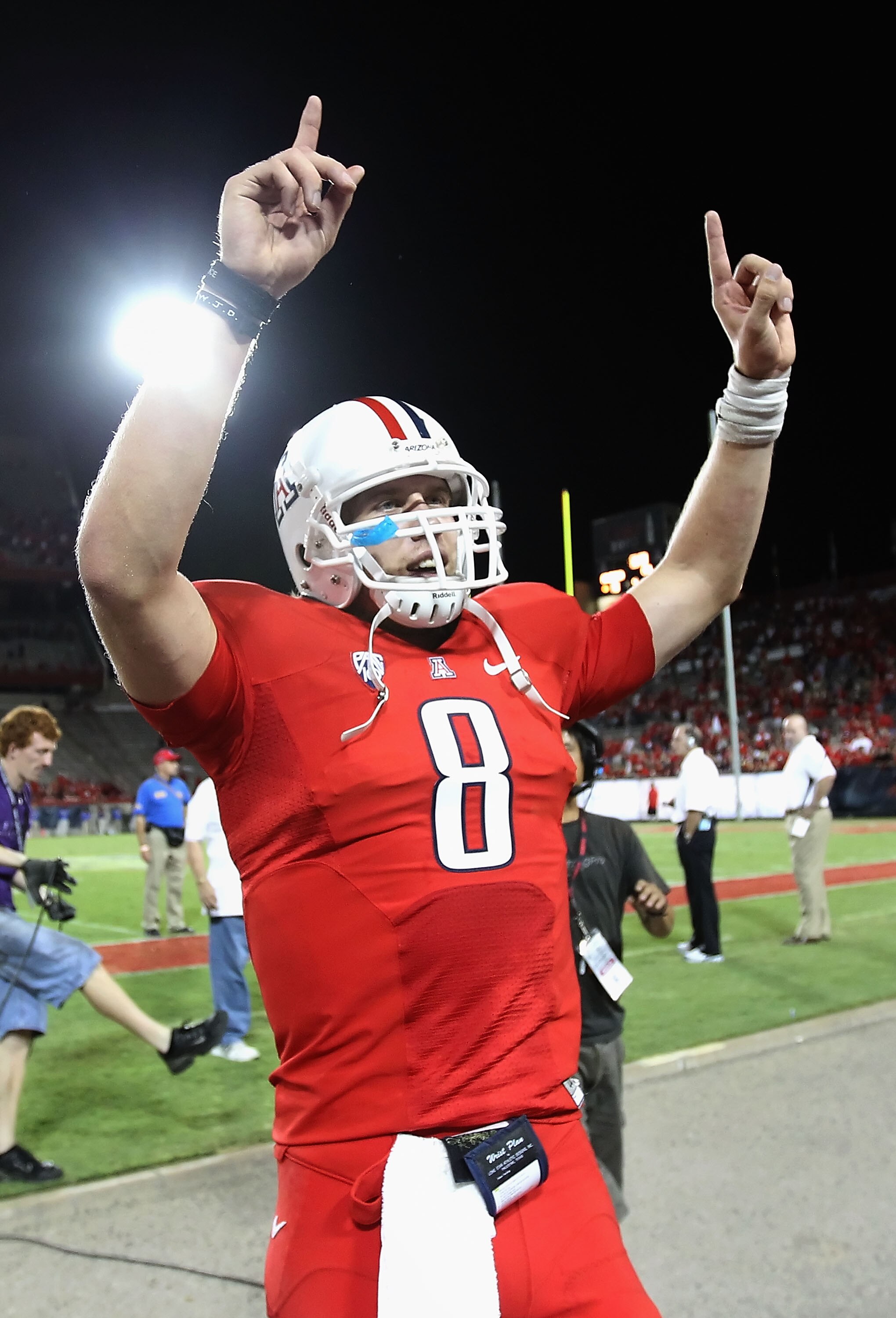 TUCSON, AZ - SEPTEMBER 25:  Quarterback Nick Foles #8 of the Arizona Wildcats celebrates after defeating the California Bears in the college football game at Arizona Stadium on September 25, 2010 in Tucson, Arizona.  The Wildcats defeated the Bears 10-9.
