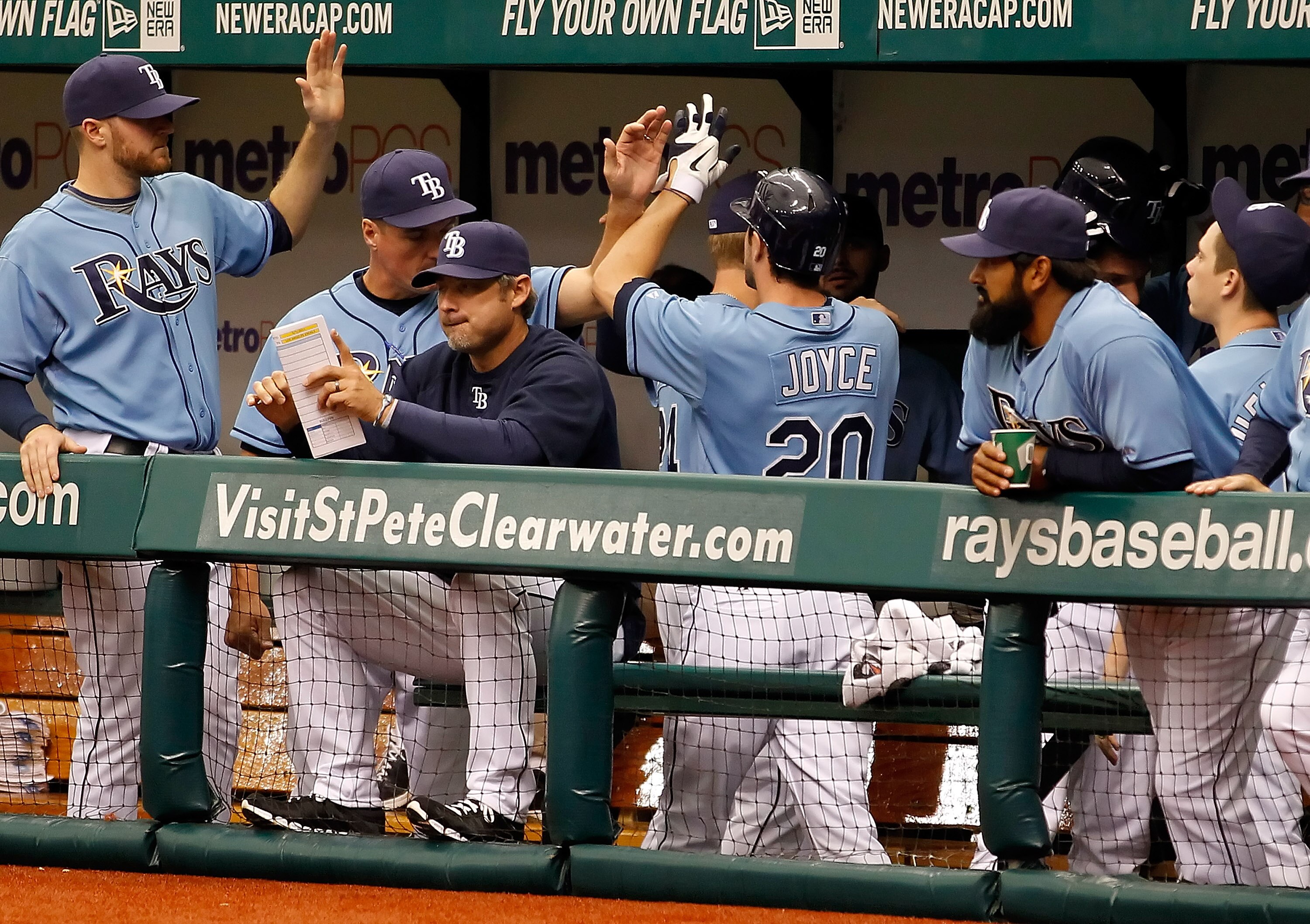 ST. PETERSBURG, FL - MAY 01:  Outfielder Matt Joyce #20 of the Tampa Bay Rays celebrates scoring against the Los Angeles Angels of Anaheim during the game at Tropicana Field on May 1, 2011 in St. Petersburg, Florida.  (Photo by J. Meric/Getty Images)