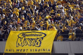 MORGANTOWN, WV - DECEMBER 1: Fans of the West Virginia Mountaineers watch the game during the game against the Pittsburgh Panthers at Milan Puskar Stadium on December 1, 2007 in Morgantown, West Virginia. (Photo by Kevin C. Cox/Getty Images)