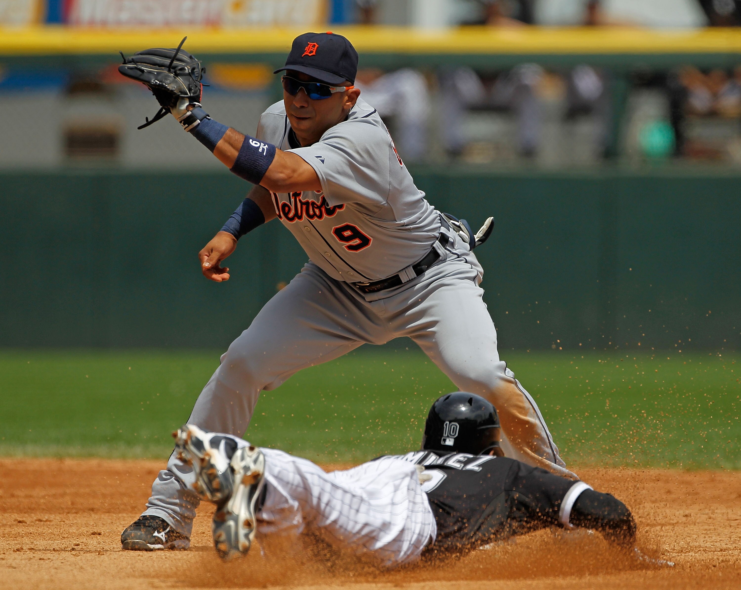 CHICAGO - JUNE 10: Carlos Guillen #9 of the Detriot Tigers prepares to tag out Alexei Ramirez #10 of the Chicago White Sox at U.S. Cellular Field on June 10, 2010 in Chicago, Illinois. The White Sox defeated the Tigers 3-0. (Photo by Jonathan Daniel/Getty