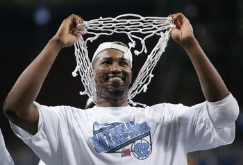ST. LOUIS - APRIL 04:  Jawad Williams #21 of the North Carolina Tar Heels celebrates with one of the nets after defeating the Illinois Fighting Illini 75-70 during the NCAA Men's National Championship game at the Edward Jones Dome on April 4, 2005 in St.
