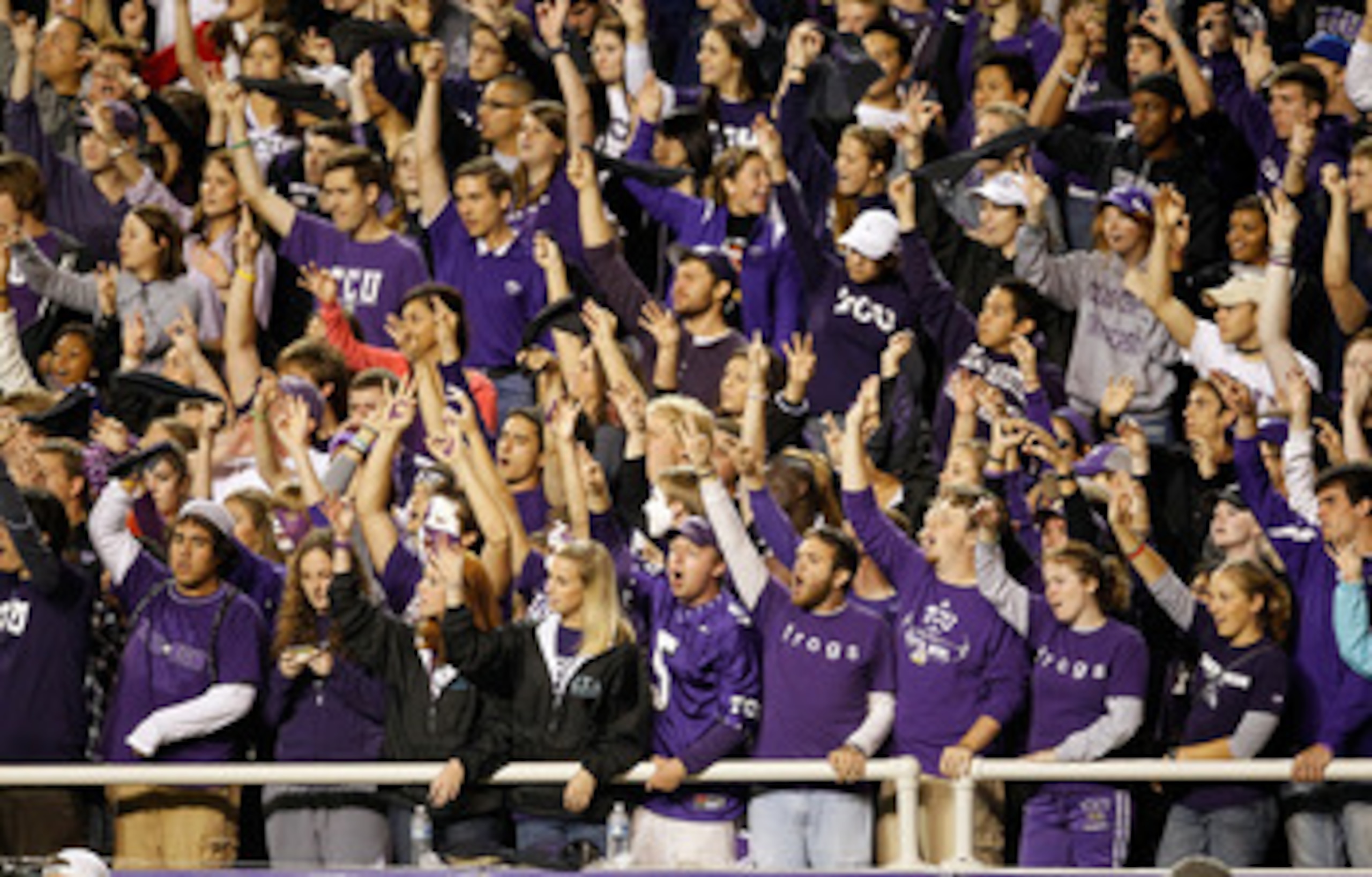 FORT WORTH, TX - OCTOBER 23:  TCU fans celebrate as TCU beats the Air Force Falcons 38-7 at Amon G. Carter Stadium on October 23, 2010 in Fort Worth, Texas.  (Photo by Tom Pennington/Getty Images)
