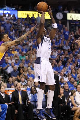 DALLAS, TX - MAY 08:  Guard Jason Terry #31 of the Dallas Mavericks takes a shot against Matt Barnes #9 of the Los Angeles Lakers in Game Four of the Western Conference Semifinals during the 2011 NBA Playoffs on May 8, 2011 at American Airlines Center in