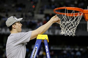 DETROIT - APRIL 06:  Tyler Hansbrough #50 of the North Carolina Tar Heels cuts down a piece of the net after their 89-72 win against the Michigan State Spartans during the 2009 NCAA Division I Men's Basketball National Championship game at Ford Field on A
