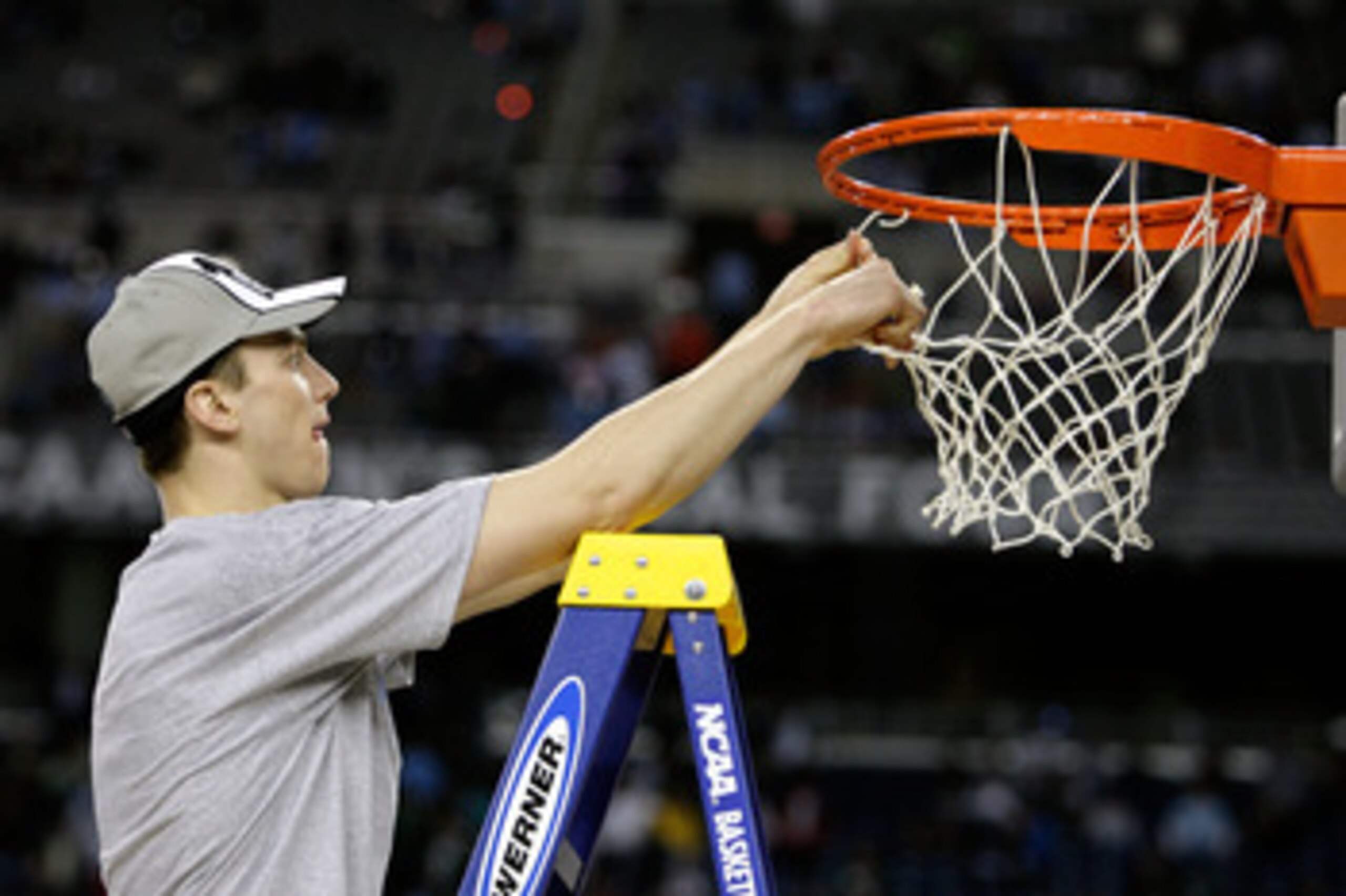 DETROIT - APRIL 06:  Tyler Hansbrough #50 of the North Carolina Tar Heels cuts down a piece of the net after their 89-72 win against the Michigan State Spartans during the 2009 NCAA Division I Men's Basketball National Championship game at Ford Field on A