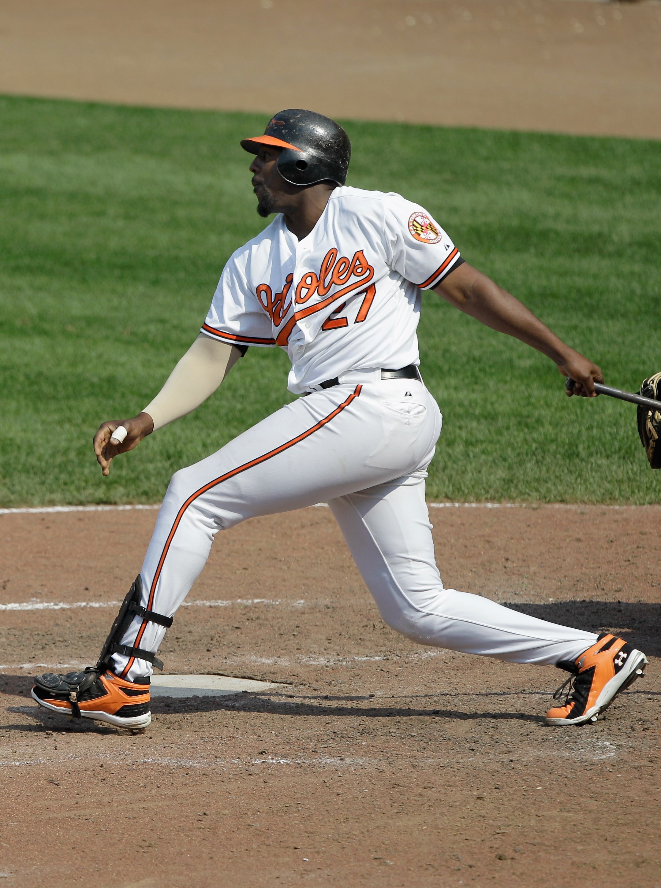 BALTIMORE, MD - MAY 26: Vladimir Guerrero #27 of the Baltimore Orioles follows his game winning RBI single to defeat the Kansas City Royals 6-5 in twelve innings at Oriole Park at Camden Yards on May 26, 2011 in Baltimore, Maryland.  (Photo by Rob Carr/Ge