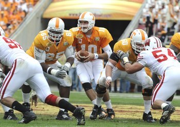 TAMPA, FL -  JANUARY 1: Quaarterback Erik Ainge #10 of the Tennessee Volunteers takes a snap against the Wisconsin Badgers in the 2008 Outback Bowl at Raymond James Stadium on January 1, 2008 in Tampa, Florida.   The Volunteers won 21 - 17. (Photo by Al M