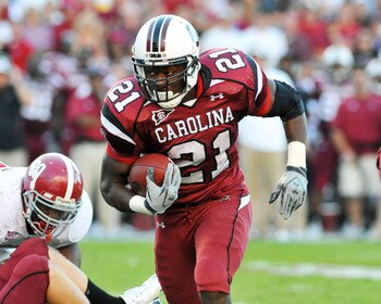 COLUMBIA, SC - OCTOBER 9: Running back Marcus Lattimore #21 of the South Carolina Gamecocks rushes upfield against the Alabama Crimson Tide October 9, 2010 at Williams-Brice Stadium in Columbia, South Carolina. (Photo by Al Messerschmidt/Getty Images) COLUMBIA, SC - OCTOBER 9: Running back Marcus Lattimore #21 of the South Carolina Gamecocks rushes upfield against the Alabama Crimson Tide October 9, 2010 at Williams-Brice Stadium in Columbia, South Carolina. (Photo by Al Messerschmidt/Getty Images)