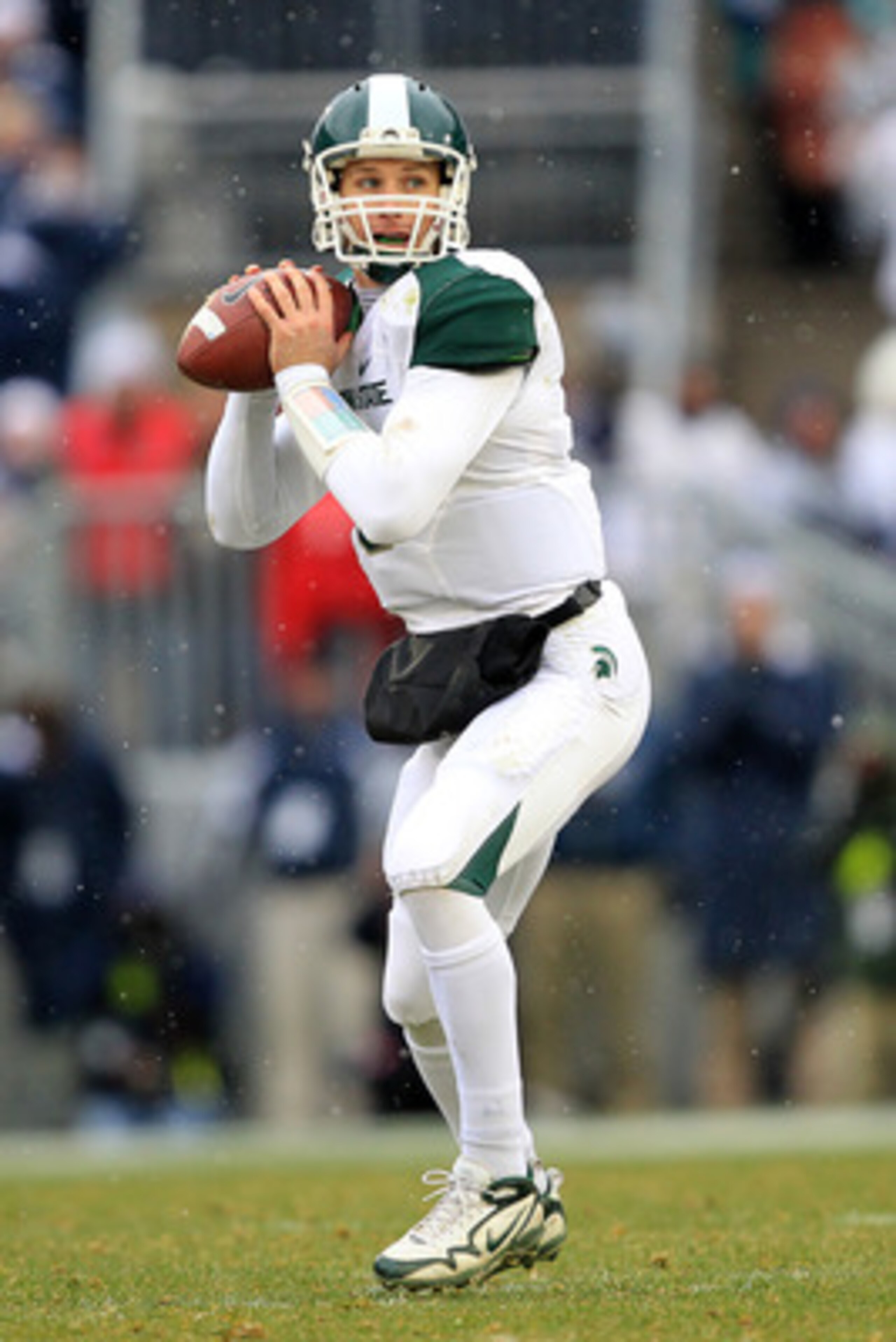 STATE COLLEGE, PA - NOVEMBER 27: Quarterback Kirk Cousins #8 of the Michigan State Spartans looks to pass during a game against the Penn State Nittany Lions on November 27, 2010 at Beaver Stadium in State College, Pennsylvania. The Spartans won 28-22. (Ph