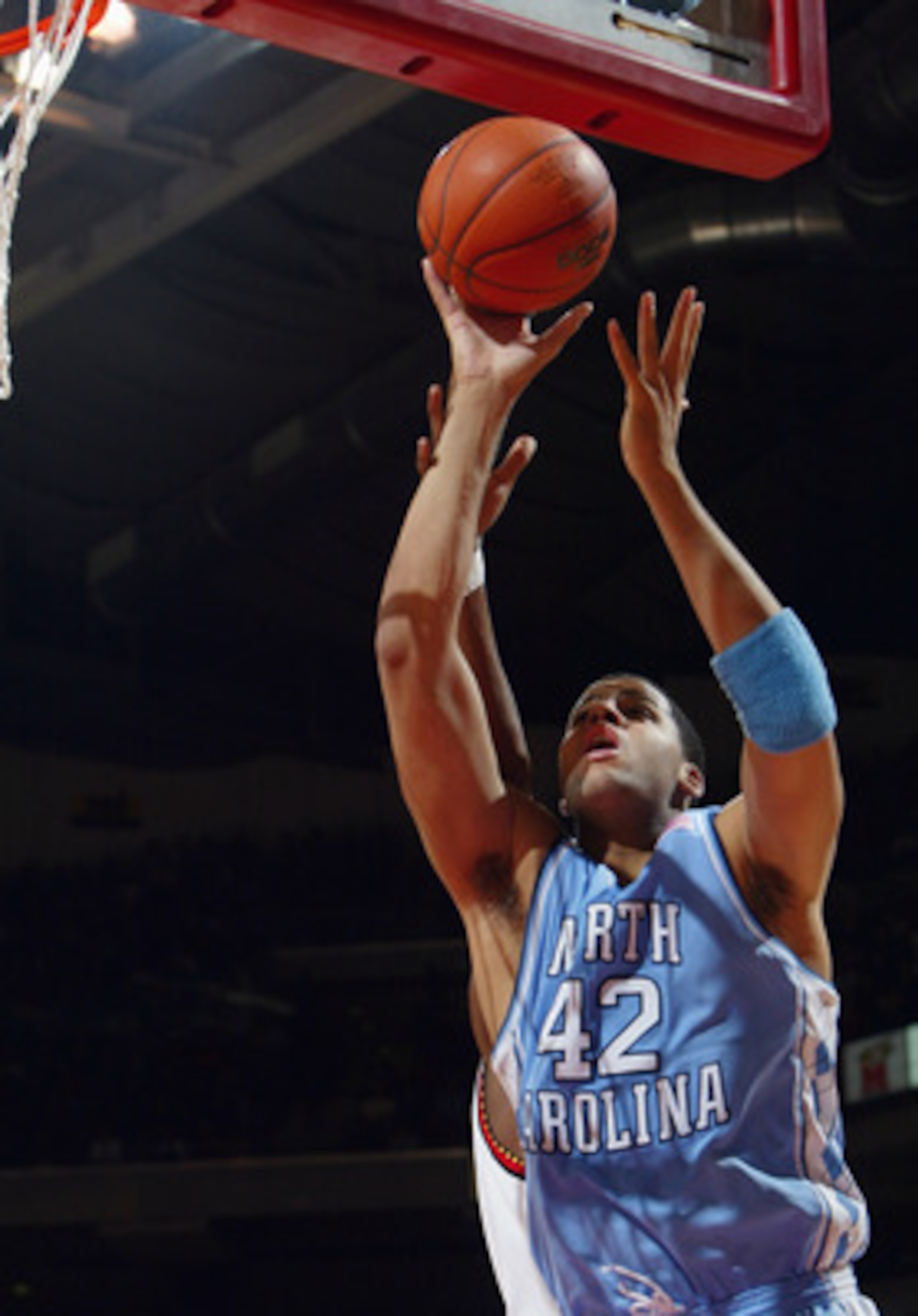COLLEGE PARK, MD - JANUARY 14:  Sean May #42 of the North Carolina Tar Heels shoots a layup during the game against the Maryland Terrapins on January 14, 2004 at the Comcast Center in College Park, Maryland. Maryland defeated UNC 90-84. (Photo by Doug Pen