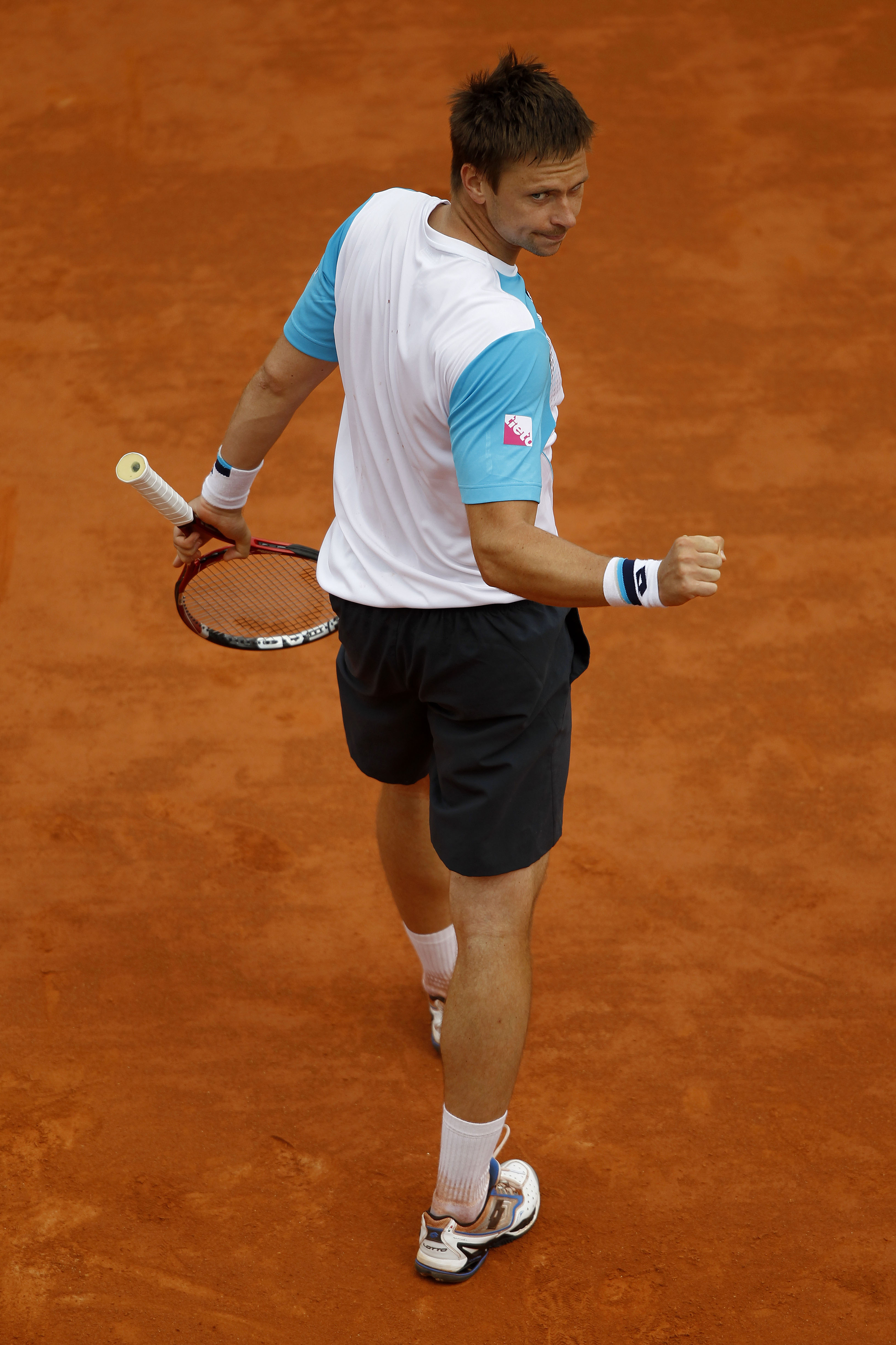 PARIS, FRANCE - MAY 26:  Robin Soderling of Sweden celebrates match point during the men's singles round two match between Albert Ramos of Spain and Robin Soderling of Sweden on day five of the French Open at Roland Garros on May 26, 2011 in Paris, France