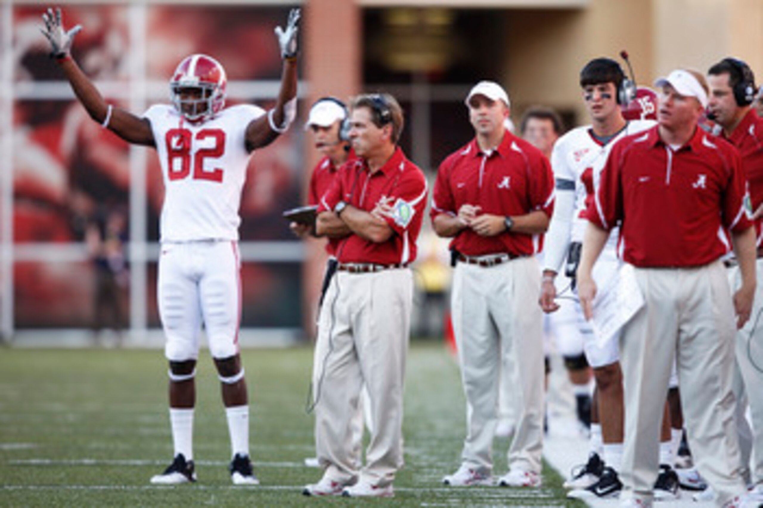 FAYETTEVILLE - SEPTEMBER 25: Alabama Crimson Tide head coach Nick Saban (C) awaits the call on the game winning touchdown by Mark Ingram (not pictured) against the Arkansas Razorbacks at Donald W. Reynolds Razorback Stadium on September 25, 2010 in Fayett