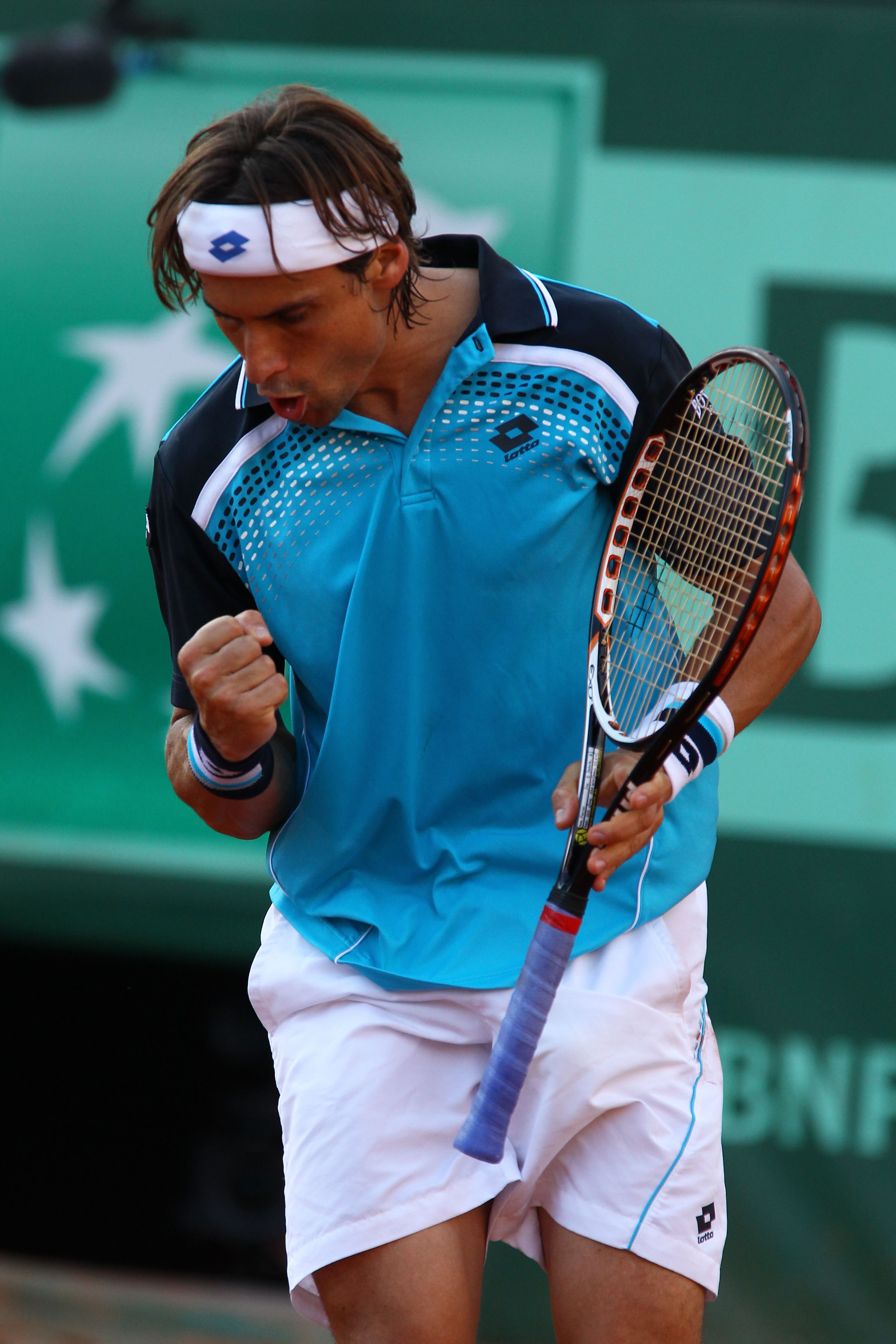 PARIS, FRANCE - MAY 29:  David Ferrer of Spain celebrates a point during the men's singles round four match between David Ferrer of Spain and Gael Monfils of France on day eight of the French Open at Roland Garros on May 29, 2011 in Paris, France.  (Photo