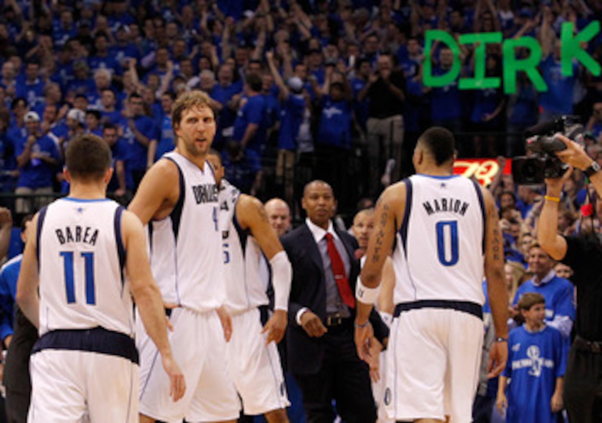 DALLAS, TX - MAY 25: Dirk Nowitzki #41 of the Dallas Mavericks looks over at teammate Jose Juan Barea #11 late in the fourth quarter while taking on the Oklahoma City Thunder in Game Five of the Western Conference Finals during the 2011 NBA Playoffs at A DALLAS, TX - MAY 25: Dirk Nowitzki #41 of the Dallas Mavericks looks over at teammate Jose Juan Barea #11 late in the fourth quarter while taking on the Oklahoma City Thunder in Game Five of the Western Conference Finals during the 2011 NBA Playoffs at A