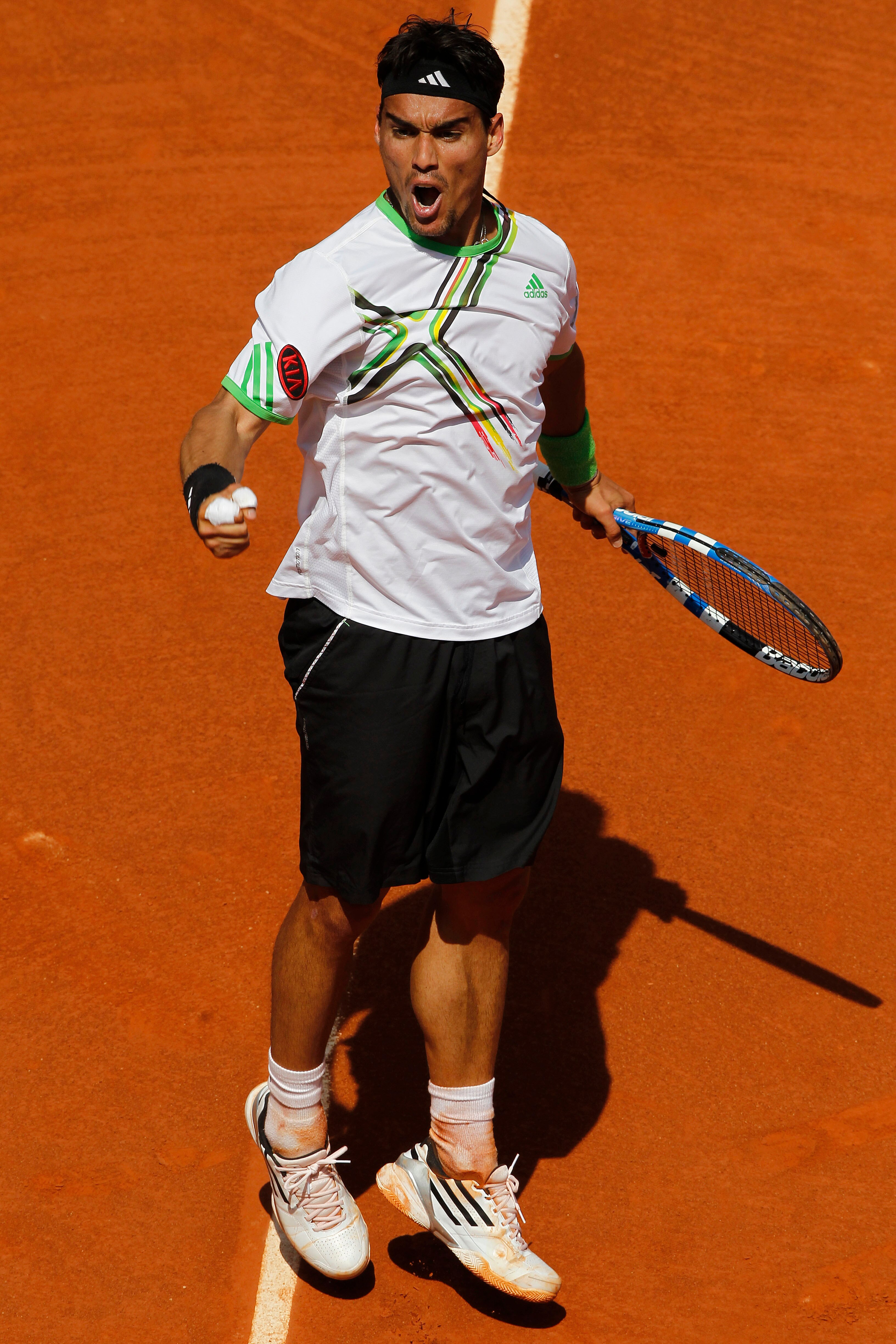 PARIS, FRANCE - MAY 29:  Fabio Fognini of Italy celebrates a break point during the men's singles round four match between Fabio Fognini of Italy and Albert Montanes of Spain on day eight of the French Open at Roland Garros on May 29, 2011 in Paris, Franc