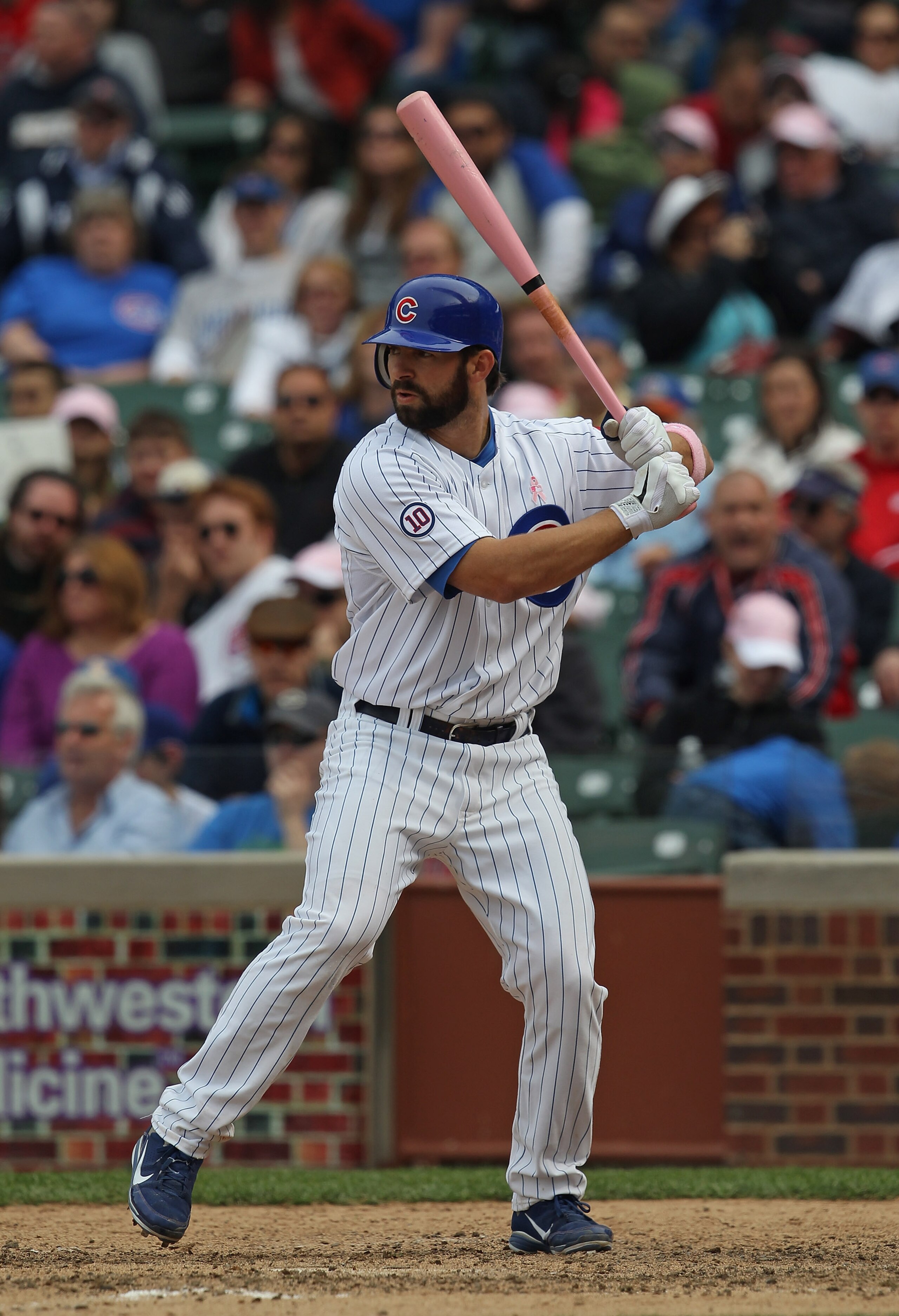 CHICAGO, IL - MAY 08: Blake DeWitt #9 of the Chicago Cubs prepares to pinch-hit against the Cincinnati Reds at Wrigley Field on May 8, 2011 in Chicago, Illinois. The Reds defeated the Cubs 2-0. (Photo by Jonathan Daniel/Getty Images)