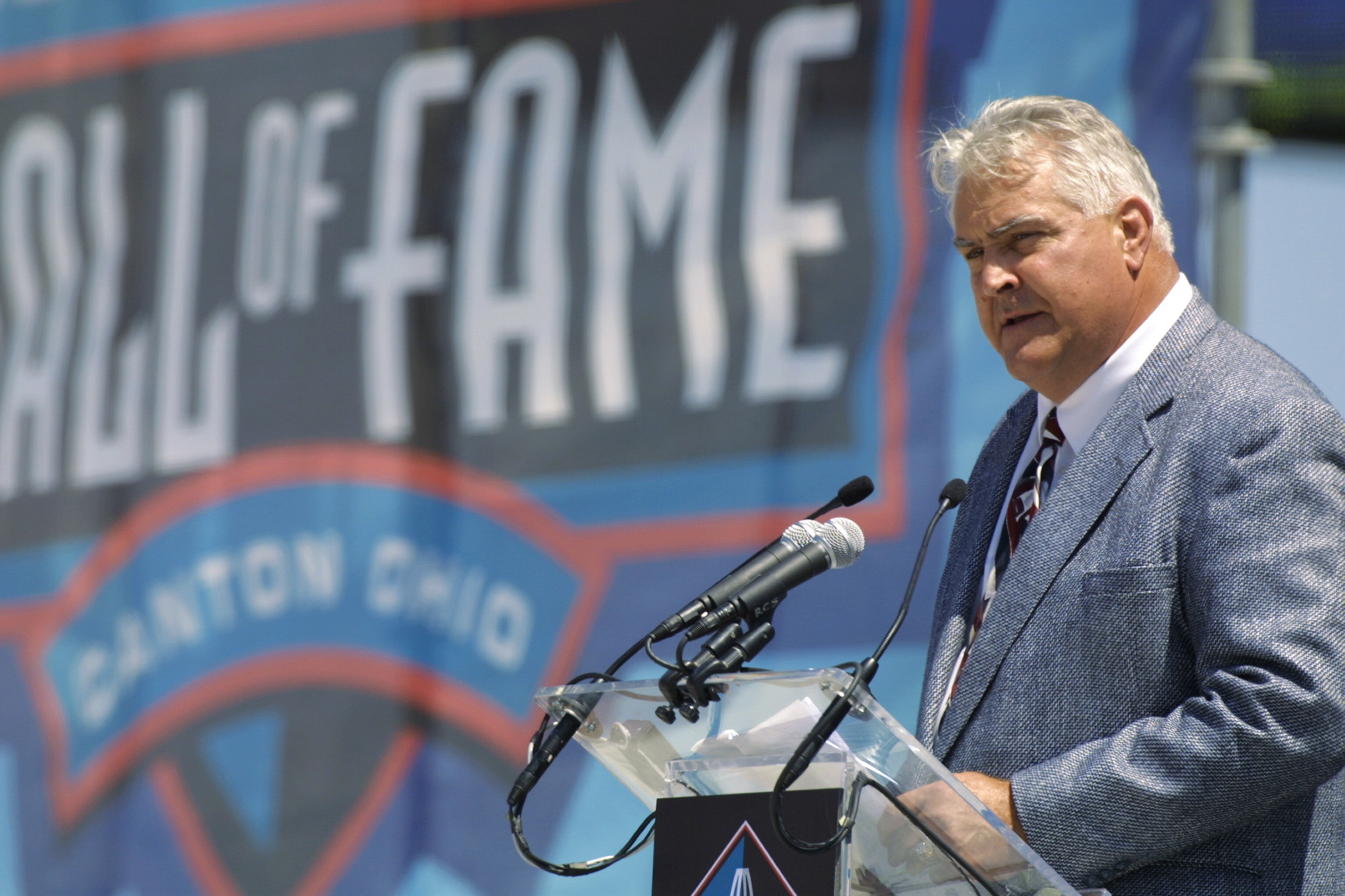 CANTON, OHIO - AUGUST 3:  Ed O?Bradovich, friend and former Bears defensive end, presents the introduction speech for Dan Hampton before his induction into the National Football League Hall of Fame on August 3, 2002 at Fawcett Stadium in Canton, Ohio.  Ha