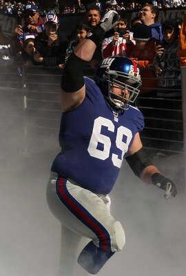 EAST RUTHERFORD, NJ - NOVEMBER 28:  Rich Seubert #69 of the New York Giants is introduced before the game against the Jacksonville Jaguars  on November 28, 2010 at The New Meadowlands Stadium in East Rutherford, New Jersey.  (Photo by Al Bello/Getty Image