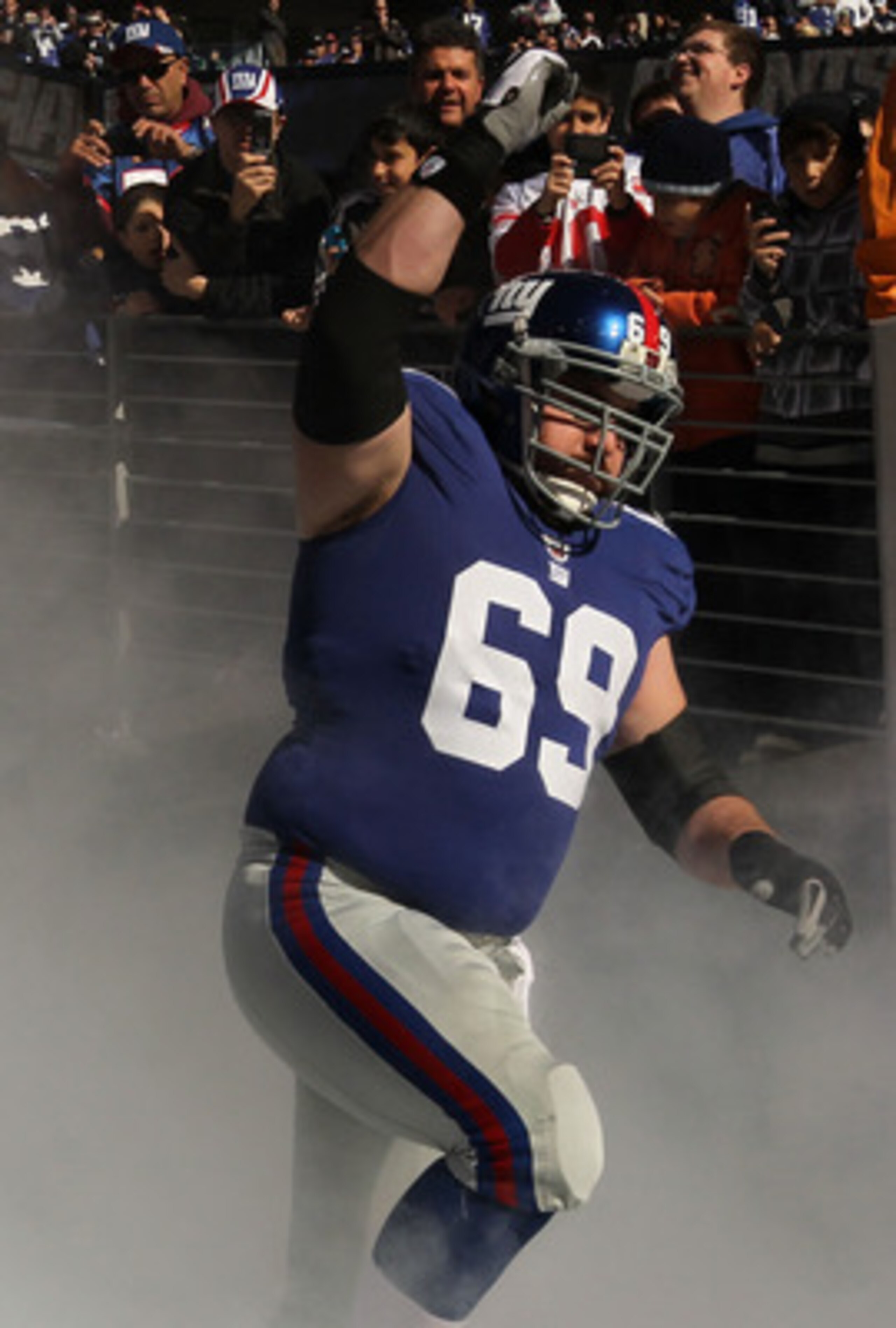 EAST RUTHERFORD, NJ - NOVEMBER 28:  Rich Seubert #69 of the New York Giants is introduced before the game against the Jacksonville Jaguars  on November 28, 2010 at The New Meadowlands Stadium in East Rutherford, New Jersey.  (Photo by Al Bello/Getty Image