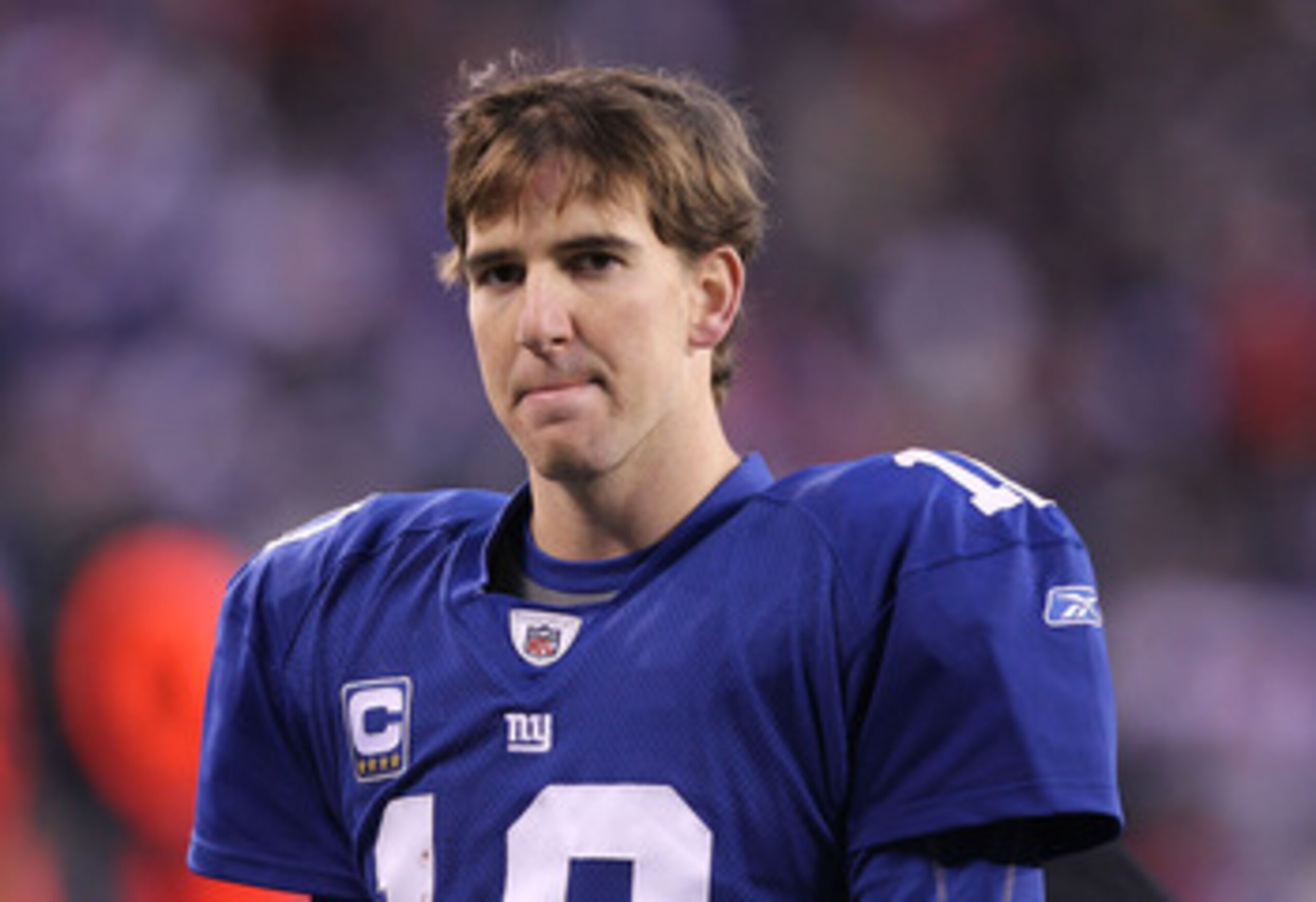 EAST RUTHERFORD, NJ - DECEMBER 19:  Eli Manning #10 of the New York Giants walks off the field dejected after losing to the Philadelphia Eagles 38-31  on December 19, 2010 at The New Meadowlands Stadium in East Rutherford, New Jersey.  (Photo by Al Bello/
