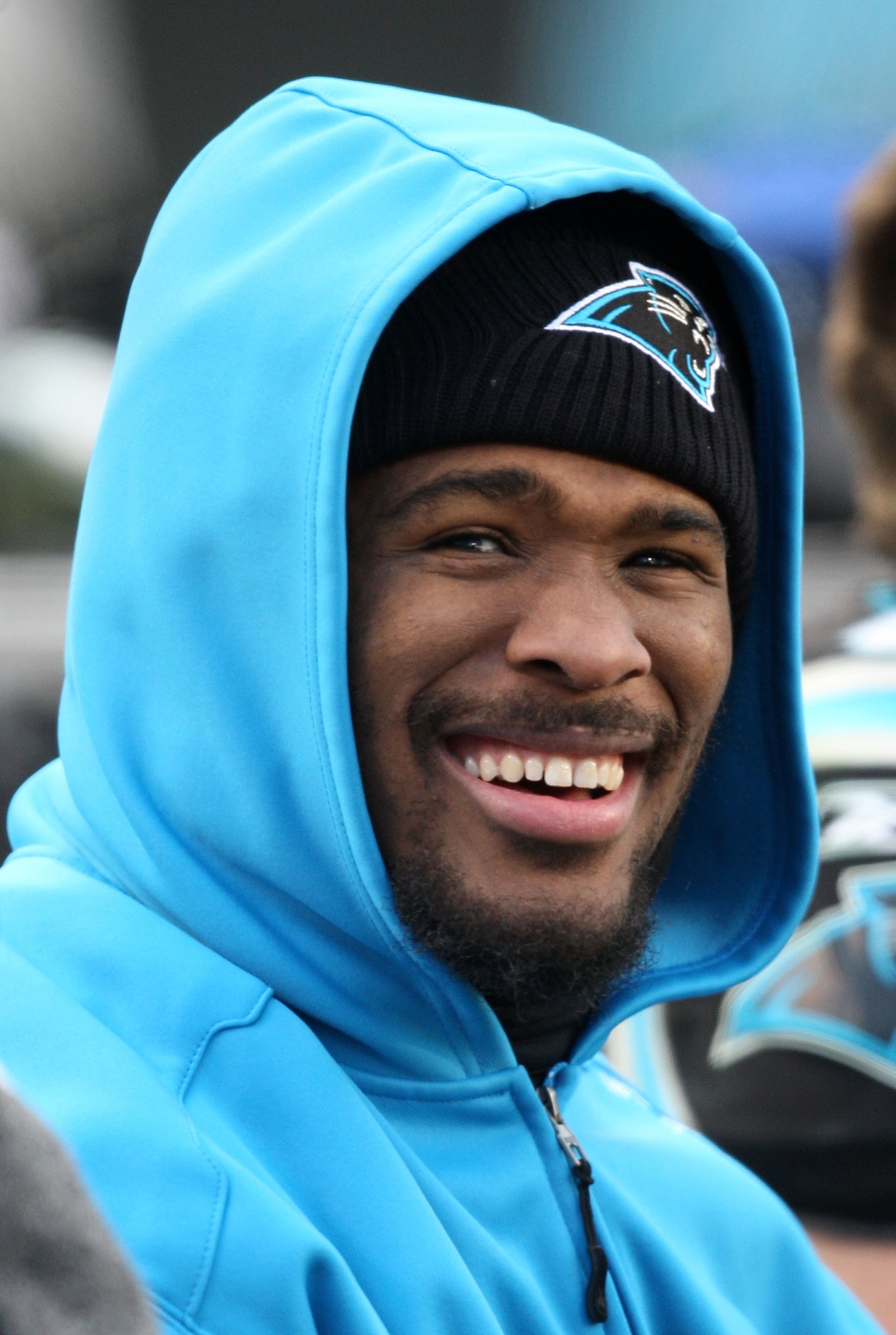 CHARLOTTE, NC - JANUARY 03:  DeAngelo Williams #34 of the Carolina Panthers smiles on the bench during their game against the New Orleans Saints at Bank of America Stadium on January 3, 2010 in Charlotte, North Carolina.  (Photo by Streeter Lecka/Getty Im