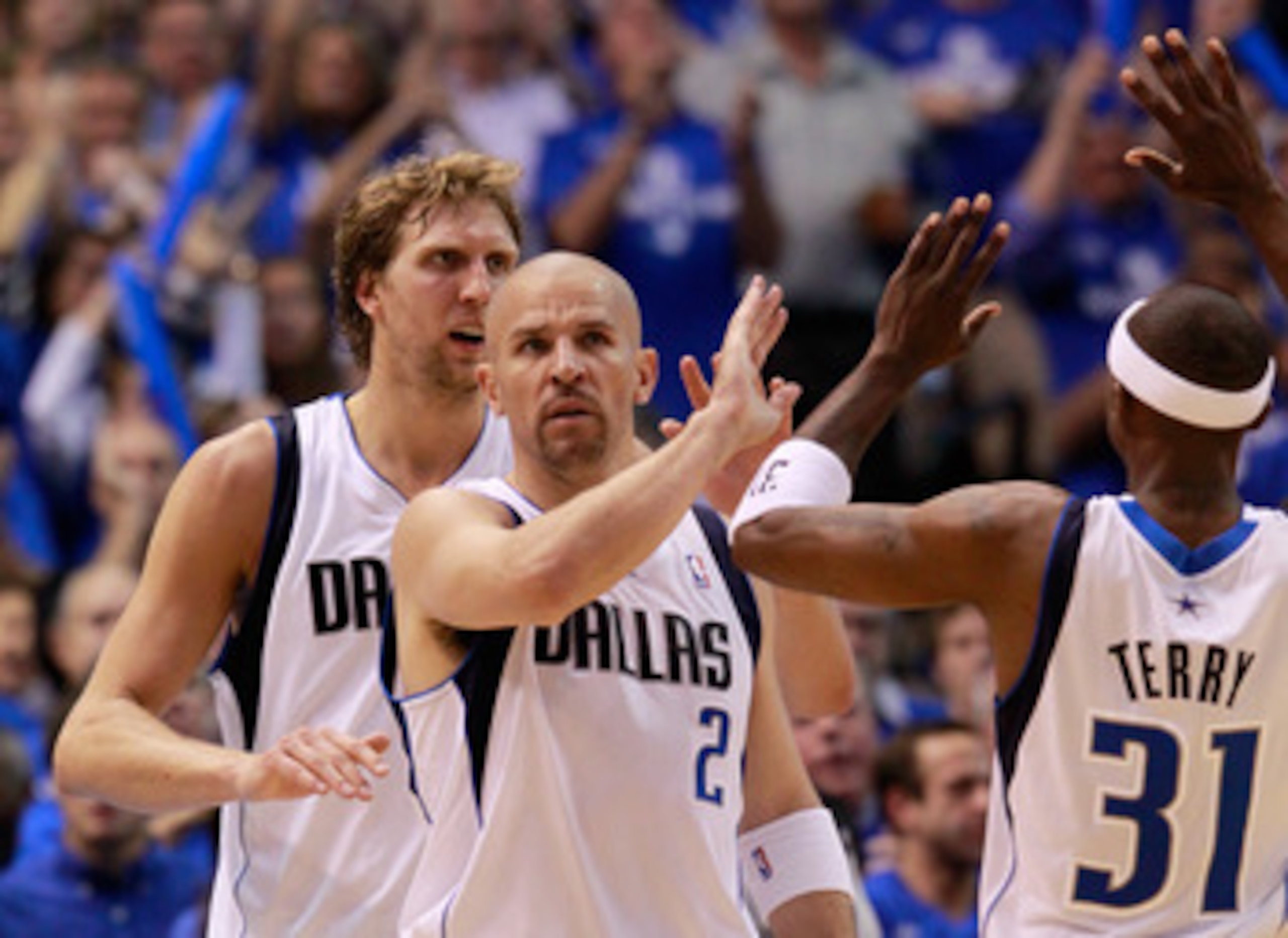 DALLAS, TX - MAY 17: Jason Kidd #2 of the Dallas Mavericks reacts with teammates Dirk Nowitzki #41 and Jason Terry #31 in the first half while taking on the Oklahoma City Thunder in Game One of the Western Conference Finals during the 2011 NBA Playoffs a DALLAS, TX - MAY 17: Jason Kidd #2 of the Dallas Mavericks reacts with teammates Dirk Nowitzki #41 and Jason Terry #31 in the first half while taking on the Oklahoma City Thunder in Game One of the Western Conference Finals during the 2011 NBA Playoffs a