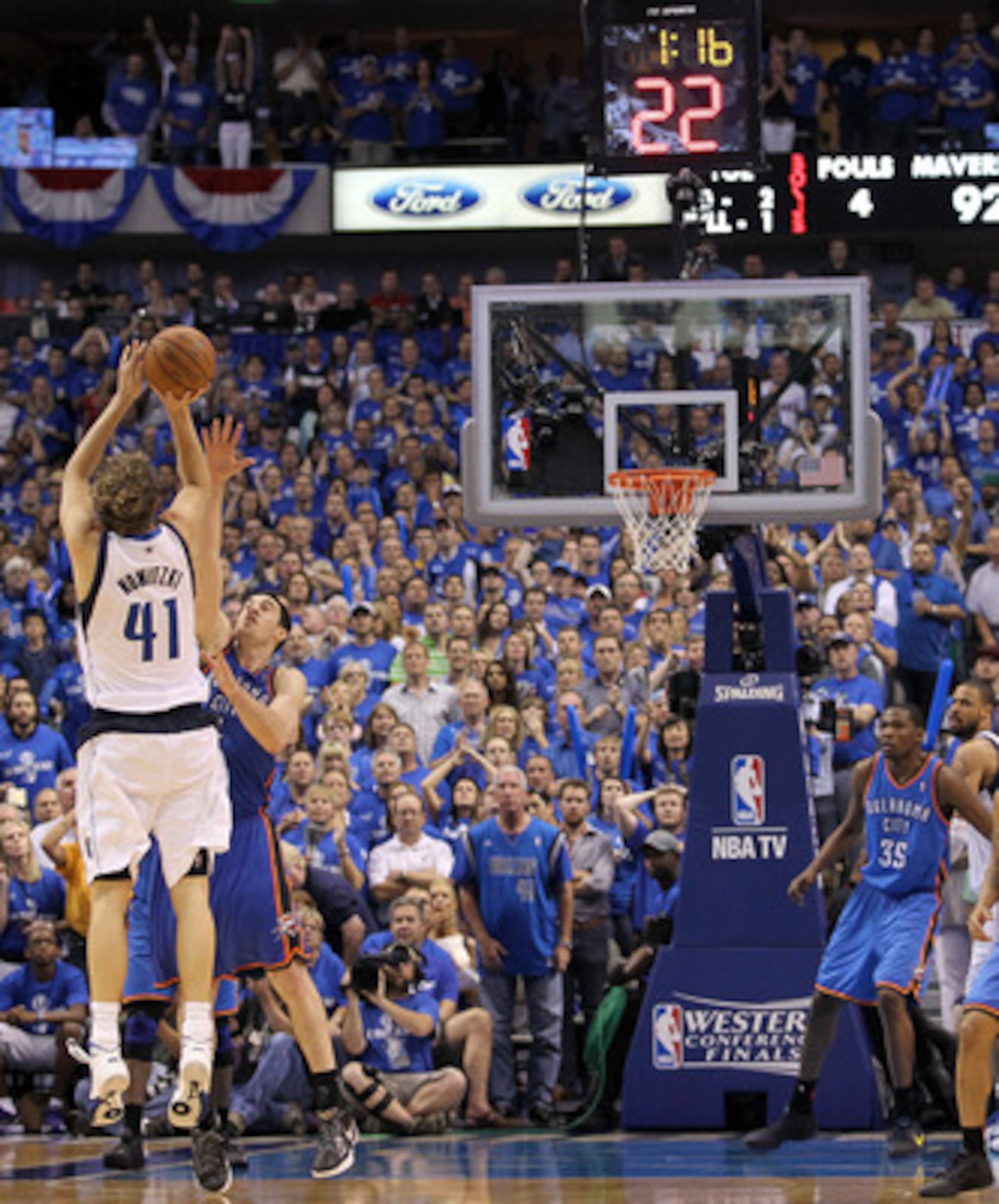 DALLAS, TX - MAY 25: Dirk Nowitzki #41 of the Dallas Mavericks makes a three-pointer in the fourth quarter over Nick Collison #4 of the Oklahoma City Thunder in Game Five of the Western Conference Finals during the 2011 NBA Playoffs at American Airlines DALLAS, TX - MAY 25: Dirk Nowitzki #41 of the Dallas Mavericks makes a three-pointer in the fourth quarter over Nick Collison #4 of the Oklahoma City Thunder in Game Five of the Western Conference Finals during the 2011 NBA Playoffs at American Airlines