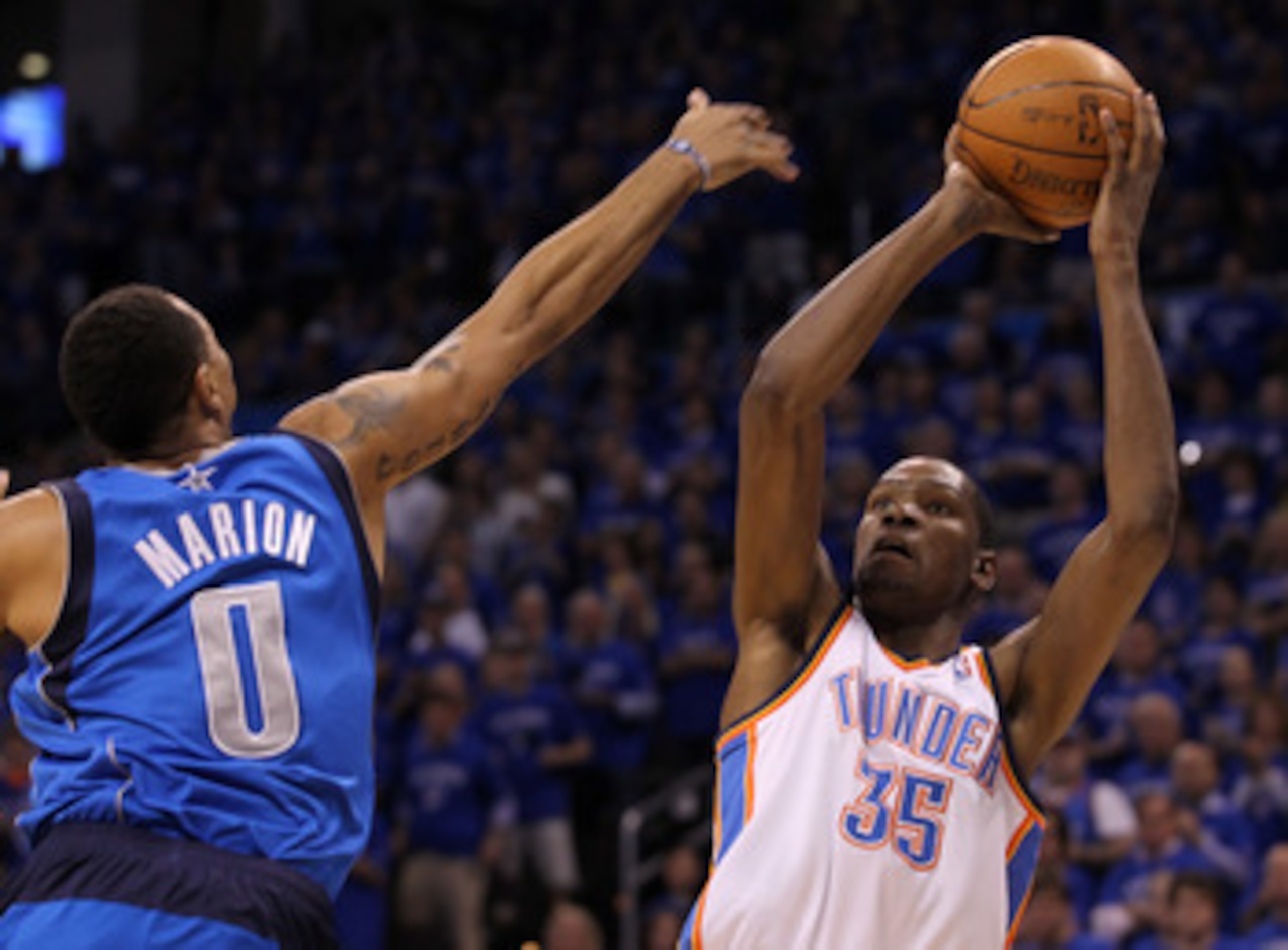 OKLAHOMA CITY, OK - MAY 23: Kevin Durant #35 of the Oklahoma City Thunder shoots over Shawn Marion #0 of the Dallas Mavericks in the first quarter in Game Four of the Western Conference Finals during the 2011 NBA Playoffs at Oklahoma City Arena on May 23 OKLAHOMA CITY, OK - MAY 23: Kevin Durant #35 of the Oklahoma City Thunder shoots over Shawn Marion #0 of the Dallas Mavericks in the first quarter in Game Four of the Western Conference Finals during the 2011 NBA Playoffs at Oklahoma City Arena on May 23