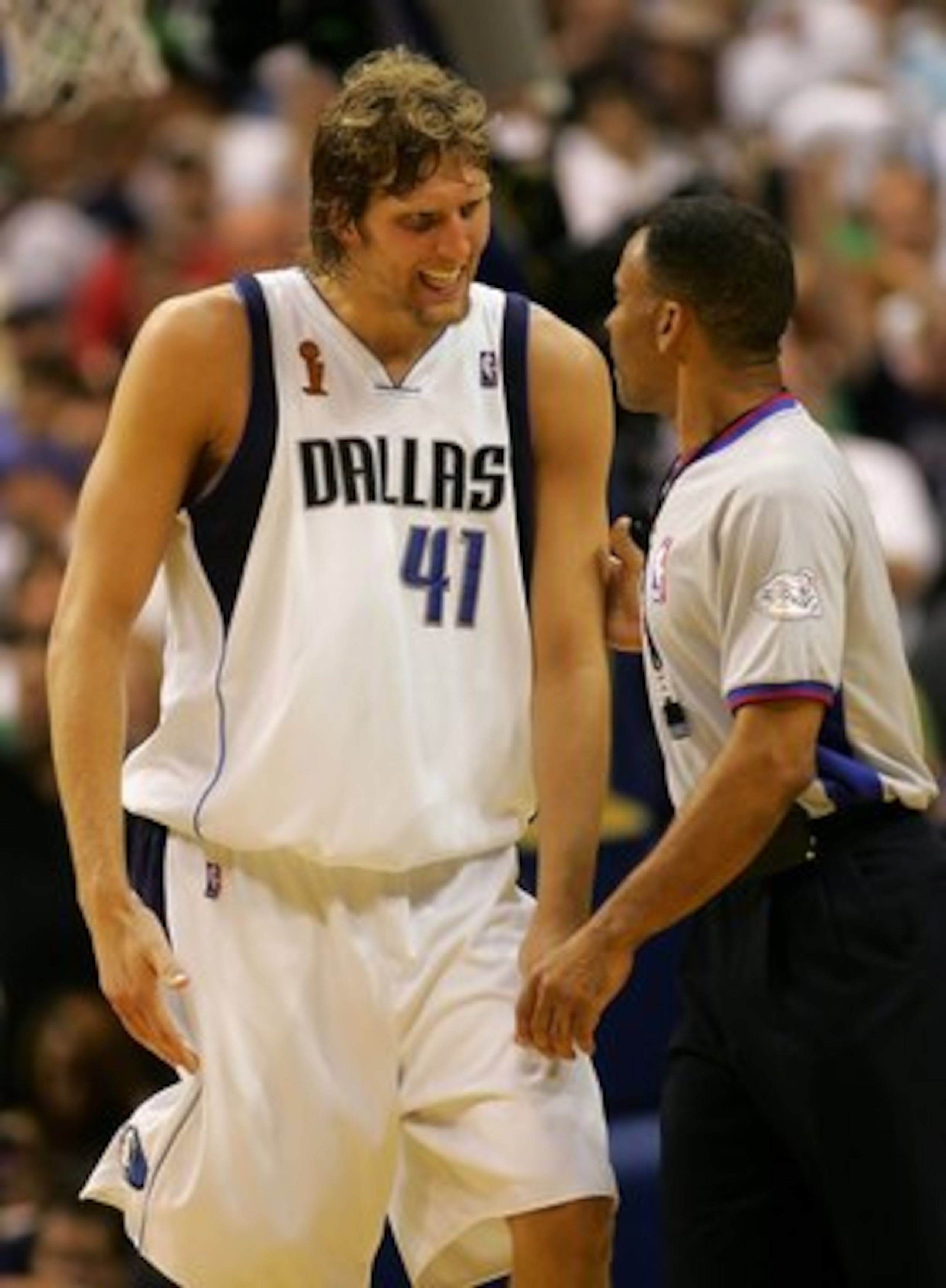 DALLAS - JUNE 20: Dirk Nowitzki #41 of the Dallas Mavericks argues with referee Dan Crawford in the second quarter of game six of the 2006 NBA Finals against the Miami Heat on June 20, 2006 at American Airlines Center in Dallas, Texas. NOTE TO USER: Use DALLAS - JUNE 20: Dirk Nowitzki #41 of the Dallas Mavericks argues with referee Dan Crawford in the second quarter of game six of the 2006 NBA Finals against the Miami Heat on June 20, 2006 at American Airlines Center in Dallas, Texas. NOTE TO USER: Use