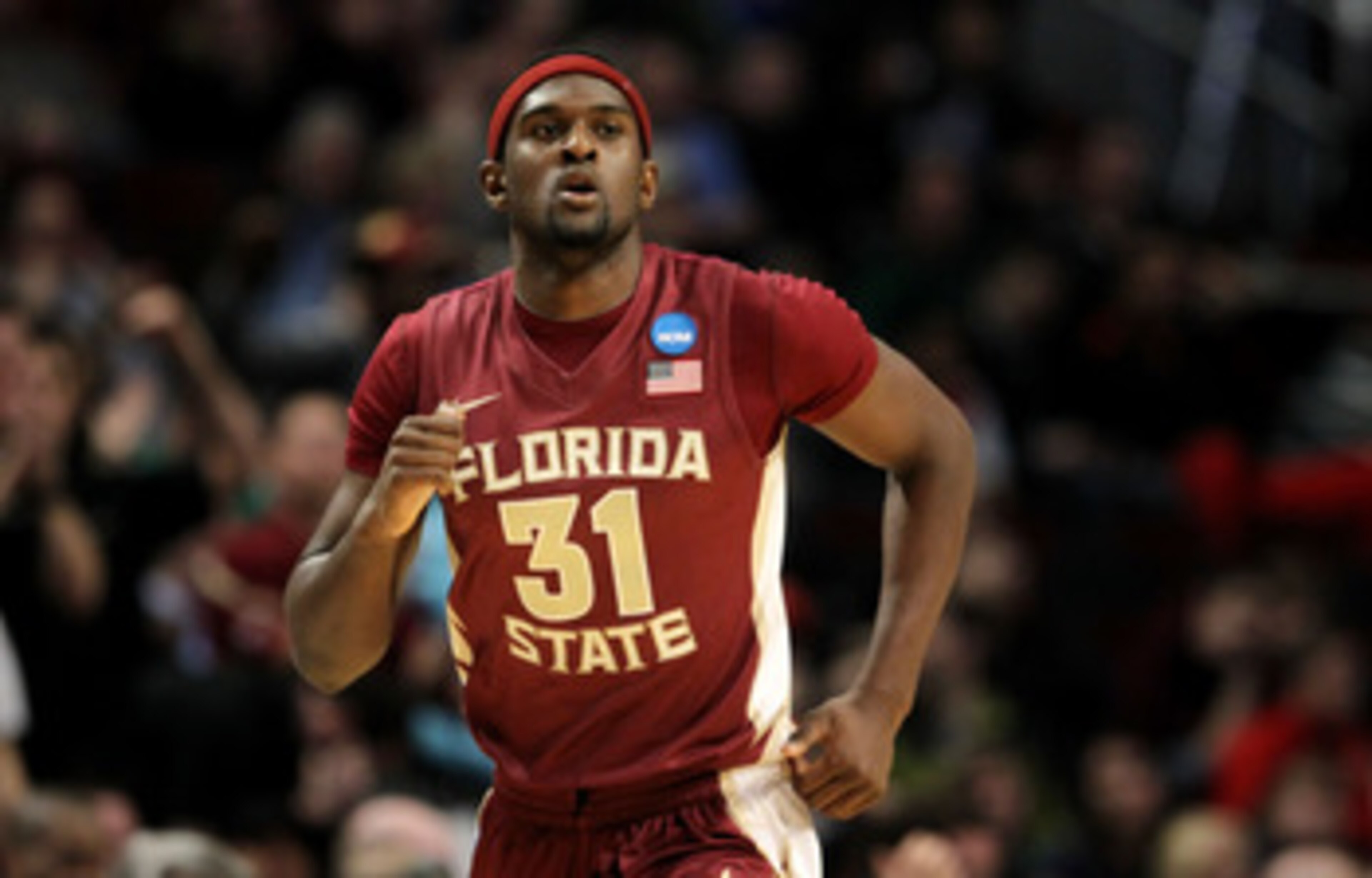 CHICAGO, IL - MARCH 18:  Chris Singleton #31 of the Florida State Seminoles jogs down court in the second half of the game against the Texas A&M Aggies during the second round of the 2011 NCAA men's basketball tournament at the United Center on March 18,