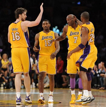 LOS ANGELES, CA - APRIL 20:  (L-R) Pau Gasol #16, Ron Artest #15, Lamar Odom #7 and Kobe Bryant #24 of the Los Angeles Lakers celebrate while taking on the New Orleans Hornets in Game Two of the Western Conference Quarterfinals in the 2011 NBA Playoffs on