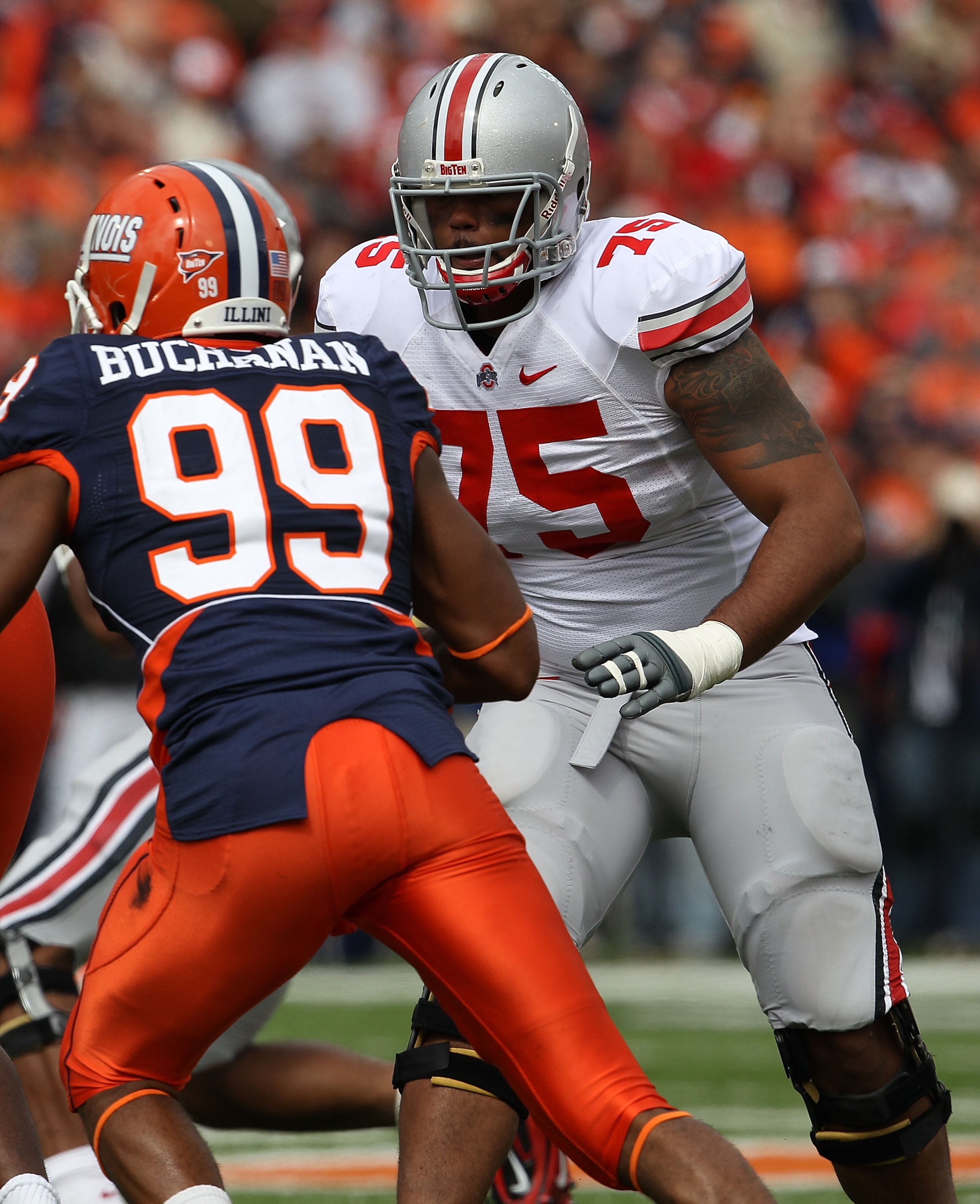 CHAMPAIGN, IL - OCTOBER 02: Mike Adams #75 of the Ohio State Buckeyes prepares to block Michael Buchanan #99 of the Illinois Fighting Illini at Memorial Stadium on October 2, 2010 in Champaign, Illinois. Ohio State defeated Illinois 24-13. (Photo by Jonat CHAMPAIGN, IL - OCTOBER 02: Mike Adams #75 of the Ohio State Buckeyes prepares to block Michael Buchanan #99 of the Illinois Fighting Illini at Memorial Stadium on October 2, 2010 in Champaign, Illinois. Ohio State defeated Illinois 24-13. (Photo by Jonat
