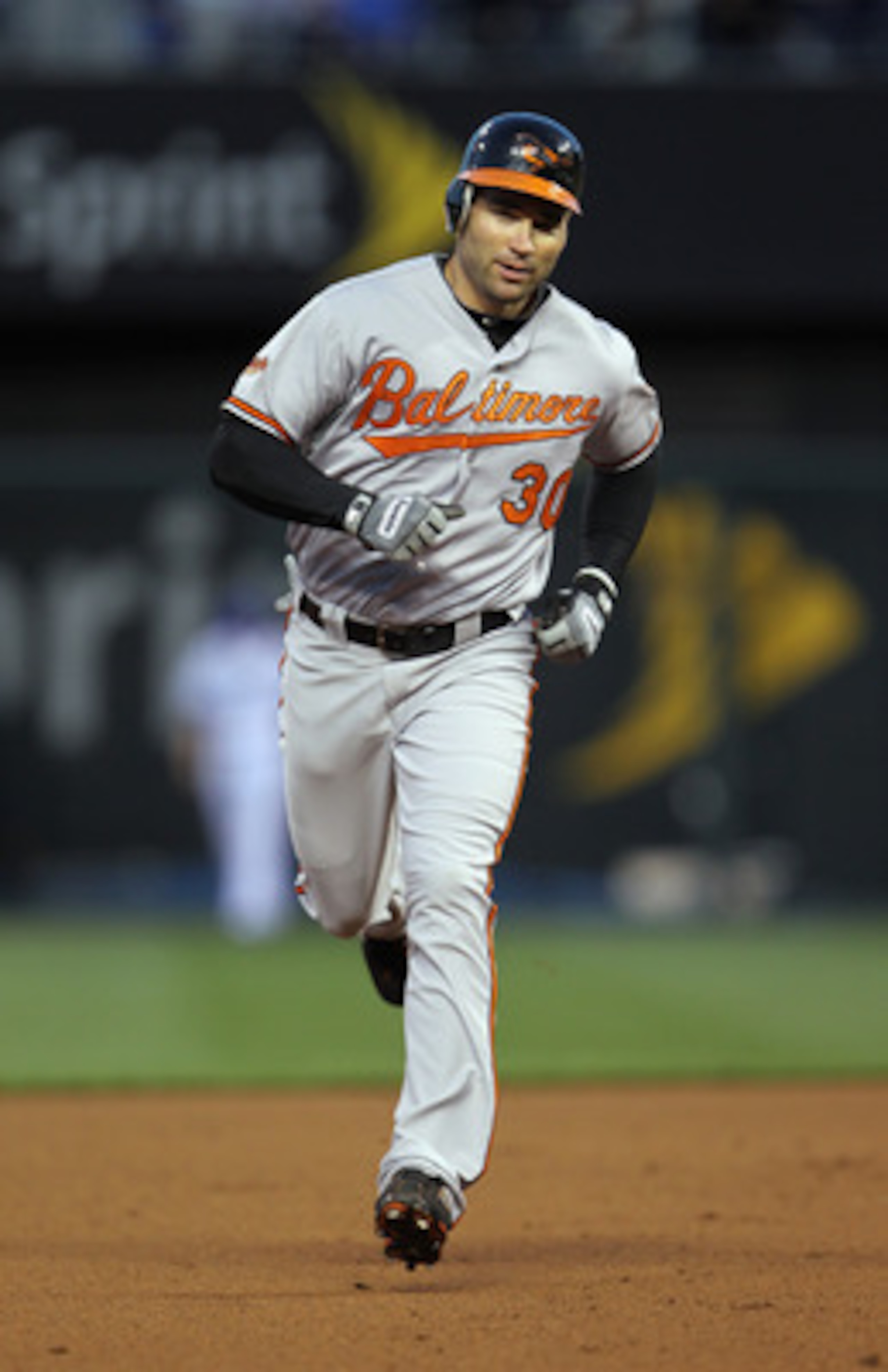 KANSAS CITY, MO - MAY 03: Luke Scott #30 of the Baltimore Orioles rounds the bases after hitting a 3-run home run during the 4th inning of the game against the Kansas City Royals on May 3, 2011 at Kauffman Stadium in Kansas City, Missouri. (Photo by Jam KANSAS CITY, MO - MAY 03: Luke Scott #30 of the Baltimore Orioles rounds the bases after hitting a 3-run home run during the 4th inning of the game against the Kansas City Royals on May 3, 2011 at Kauffman Stadium in Kansas City, Missouri. (Photo by Jam