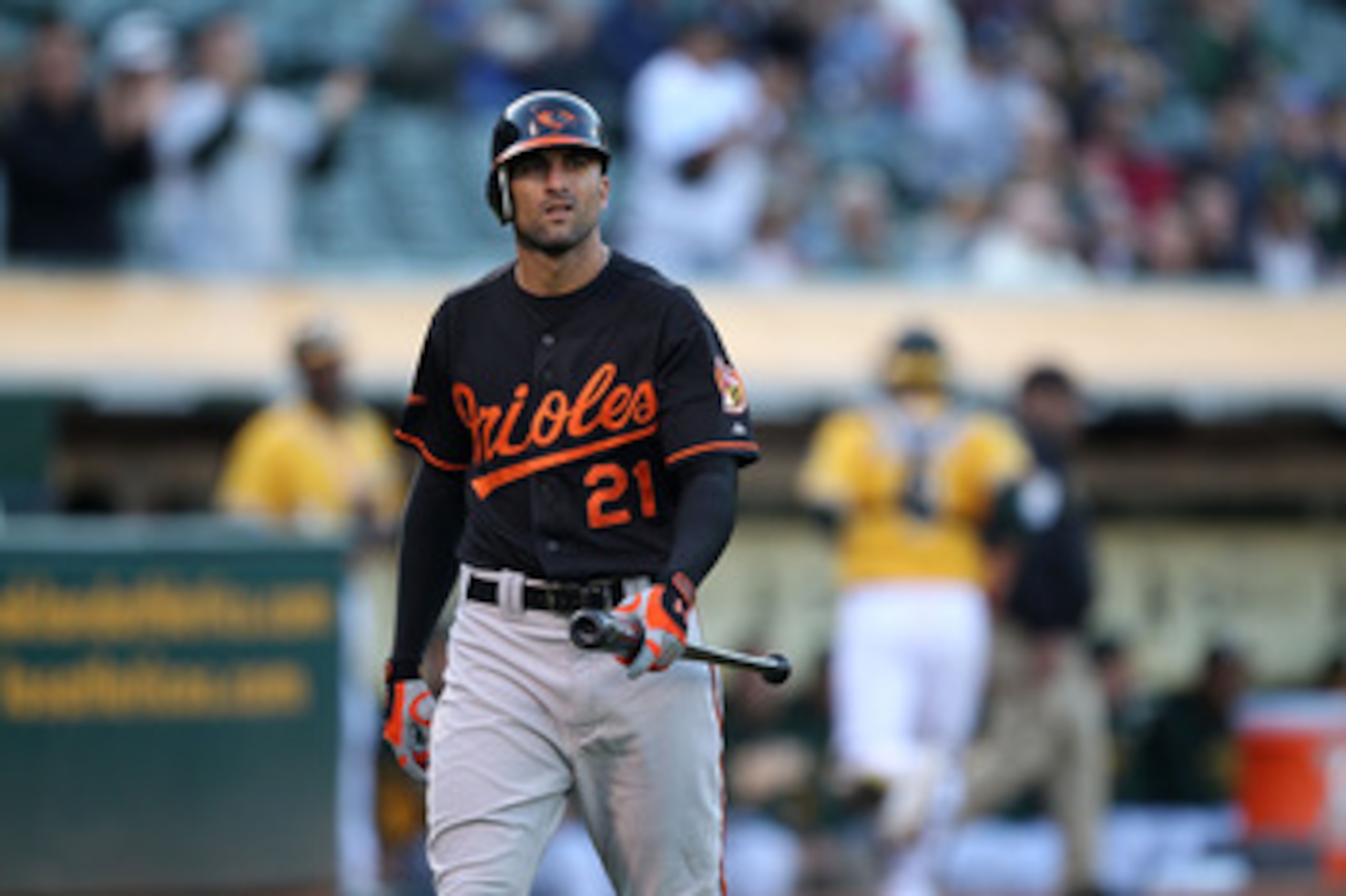 OAKLAND, CA - MAY 27: Nick Markakis #21 of the Baltimore Orioles reacts after striking out in the first inning against the Oakland Athletics during a Major League Baseball game at the Oakland-Alameda County Coliseum on May 27, 2011 in Oakland, California OAKLAND, CA - MAY 27: Nick Markakis #21 of the Baltimore Orioles reacts after striking out in the first inning against the Oakland Athletics during a Major League Baseball game at the Oakland-Alameda County Coliseum on May 27, 2011 in Oakland, California