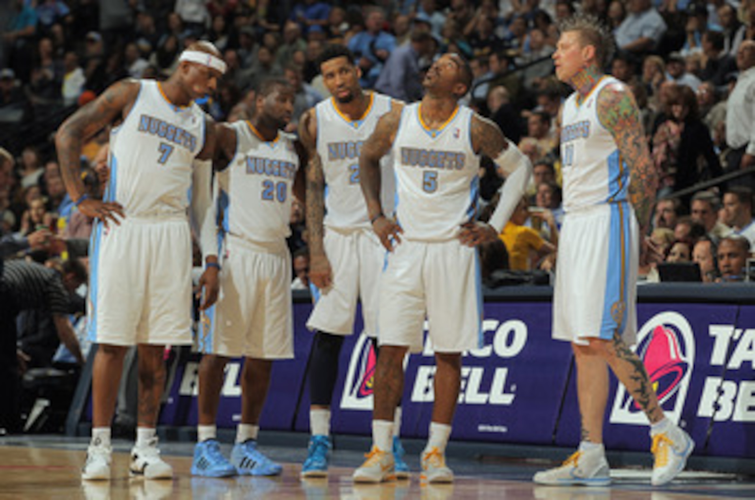DENVER, CO - APRIL 25:  Al Harrington #7, Raymond Felton #20, Wilson Chandler, J.R. Smith #5 and Chris Andersen #11 of the Denver Nuggets look on as they face the Oklahoma City Thunder in Game Four of the Western Conference Quarterfinals in the 2011 NBA P