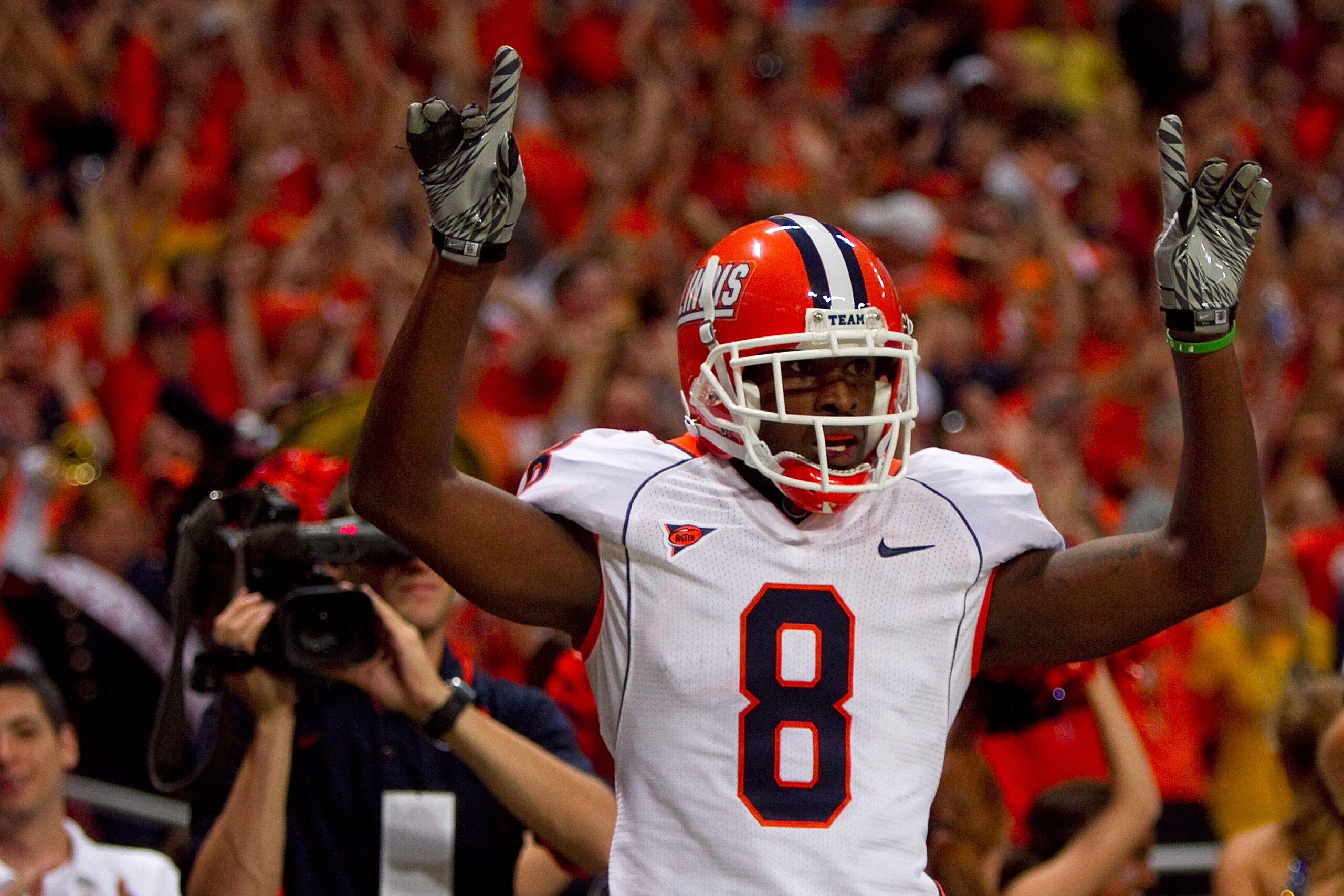 ST. LOUIS - SEPTEMBER 4: A.J. Jenkins #8 of the University of Illinois Fighting Illini celebrates his touchdown against the University of Missouri Tigers during the State Farm Arch Rivalry game on September 4, 2010 at the Edward Jones Dome in St. Louis, M ST. LOUIS - SEPTEMBER 4: A.J. Jenkins #8 of the University of Illinois Fighting Illini celebrates his touchdown against the University of Missouri Tigers during the State Farm Arch Rivalry game on September 4, 2010 at the Edward Jones Dome in St. Louis, M
