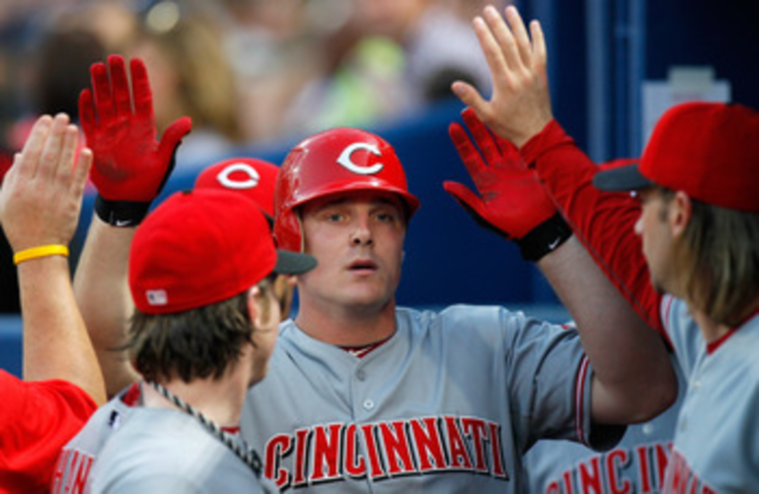 ATLANTA, GA - MAY 29:  Jay Bruce #32 of the Cincinnati Reds celebrates in the dugout after hitting a solo homer in the second inning against the Atlanta Braves at Turner Field on May 29, 2011 in Atlanta, Georgia.  (Photo by Kevin C. Cox/Getty Images)