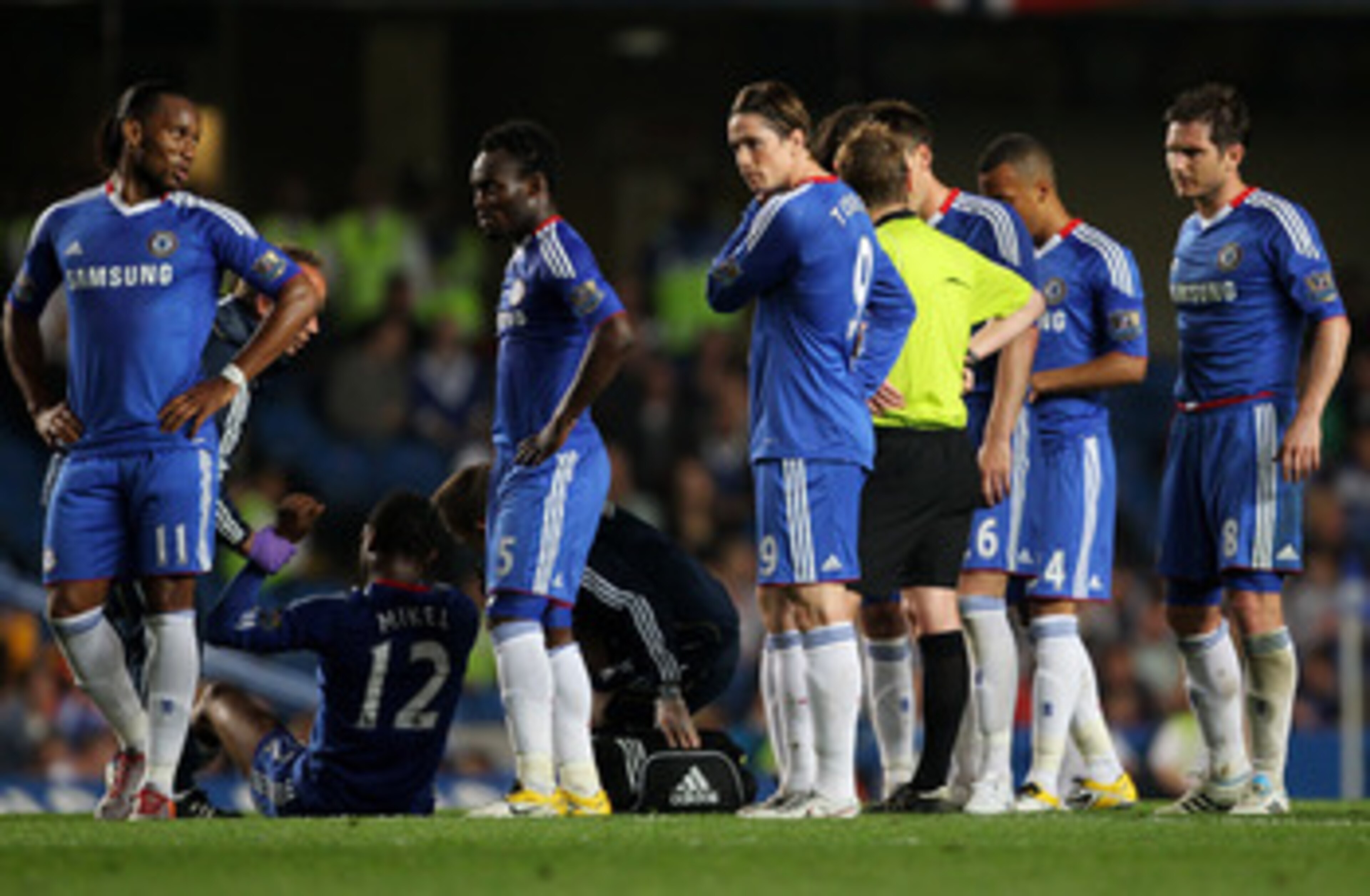LONDON, ENGLAND - APRIL 20:  Fernando Torres of Chelsea looks on with team mates during the Barclays Premier League match between Chelsea and Birmingham City at Stamford Bridge on April 20, 2011 in London, England.  (Photo by Clive Rose/Getty Images)