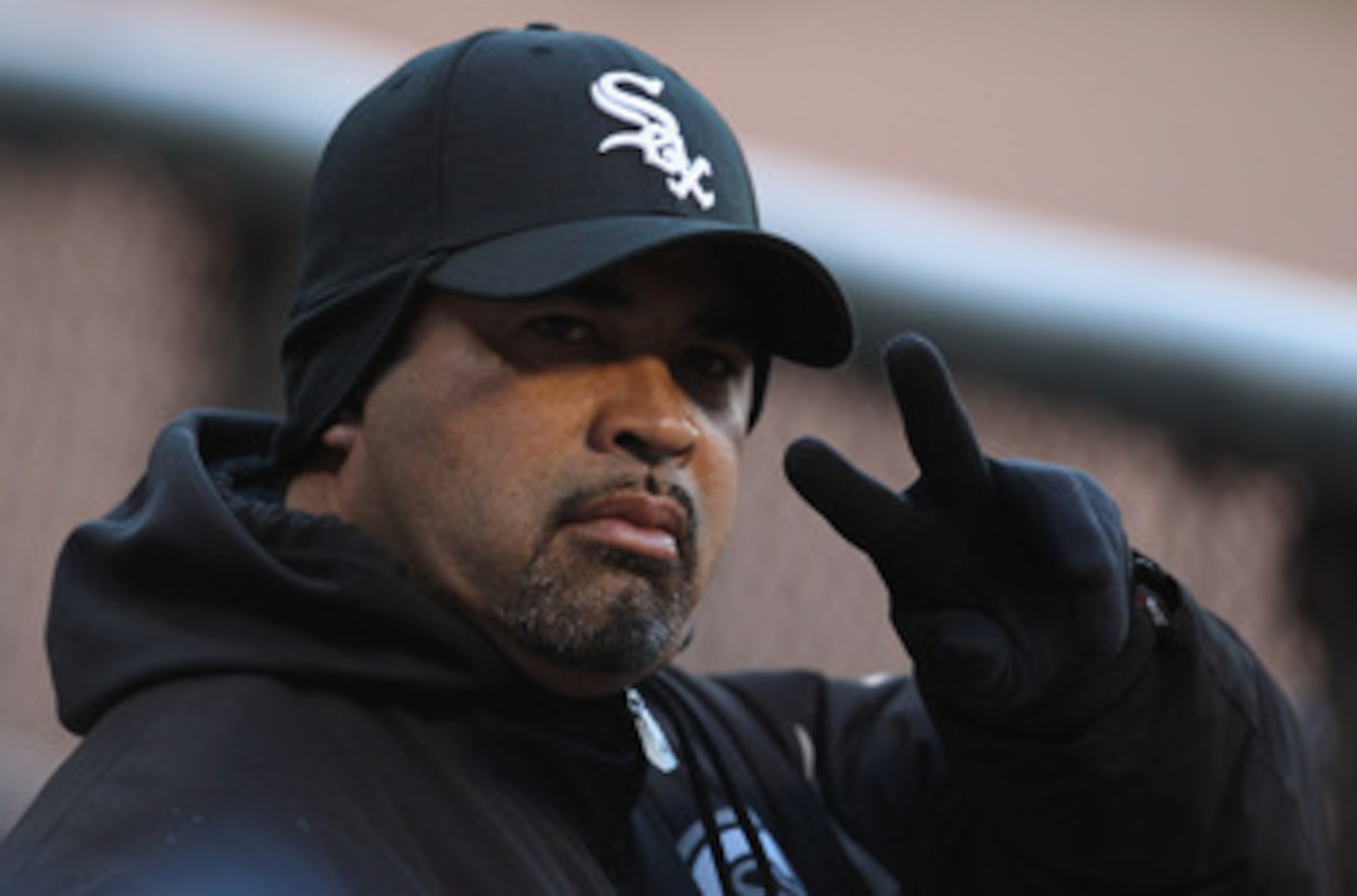 CHICAGO, IL - MAY 16: Manager Ozzie Guillen #13 of the Chicago White Sox waves to fans before a game against the Texas Rangers at U.S. Cellular Field on May 16, 2011 in Chicago, Illinois. The Rangers defeated the White Sox 4-0. (Photo by Jonathan Daniel/G