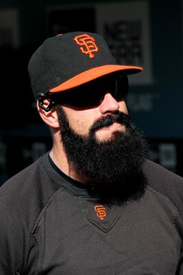 LOS ANGELES, CA - MAY 18:  Closer Brian Wilson #38 of the San Francisco Giants stands in the dugout before the game with the Los Angeles Dodgers on May 18, 2011 at Dodger Stadium in Los Angeles, California.  (Photo by Stephen Dunn/Getty Images)